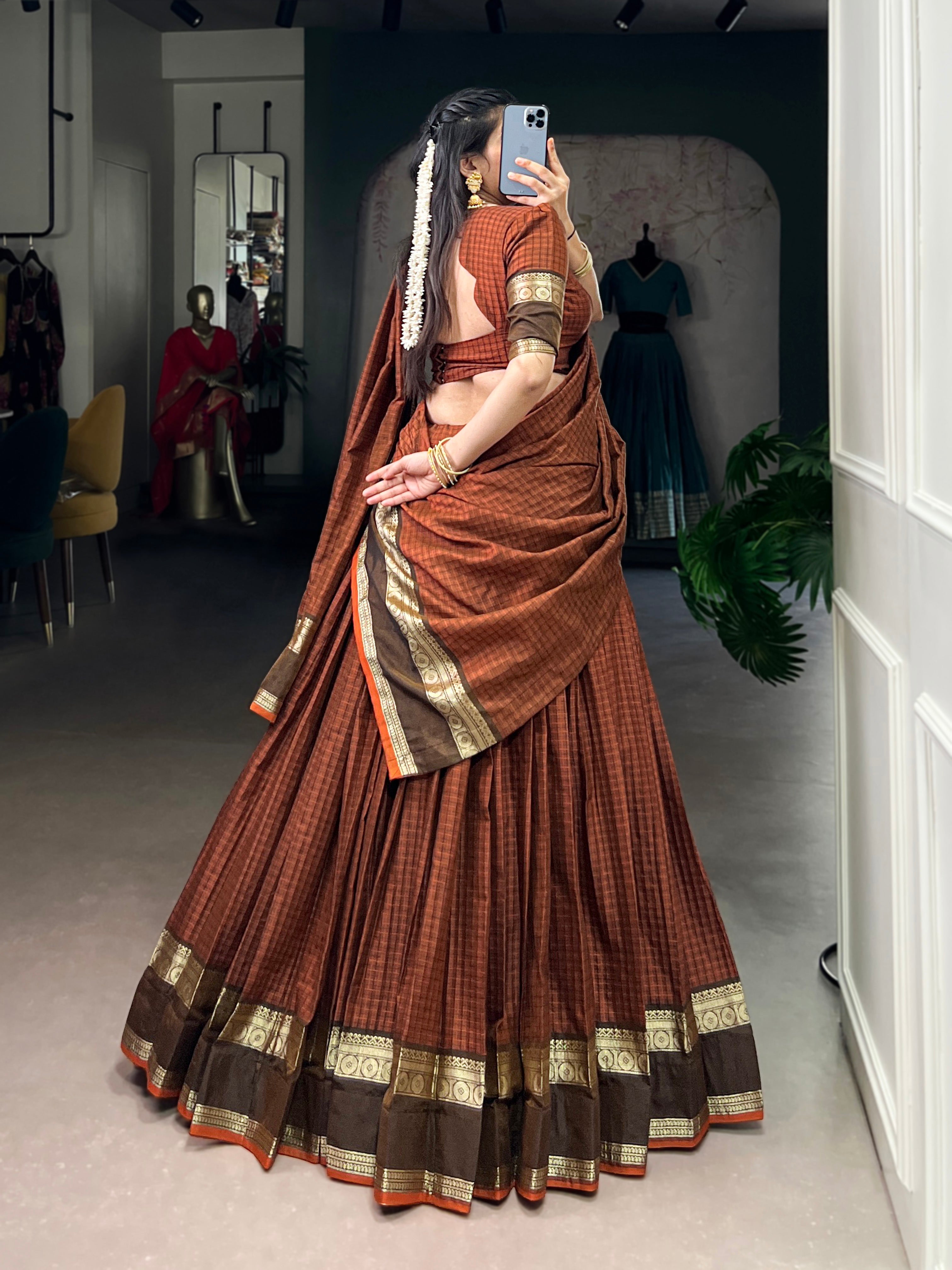 Rimi rust orange Chettinad cotton chex half-saree lehenga with rich zari weaving work