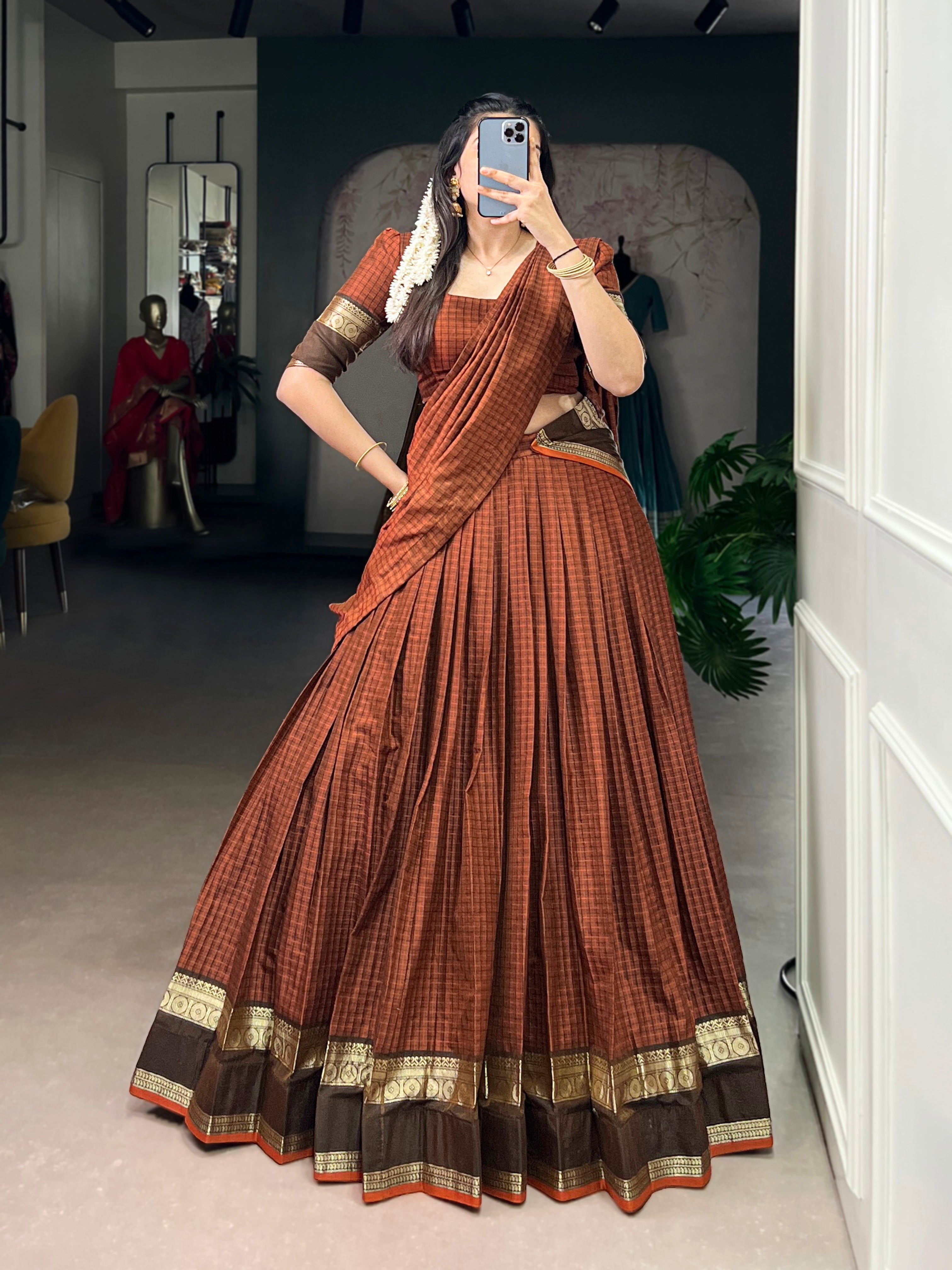 Rimi rust orange Chettinad cotton chex half-saree lehenga with rich zari weaving work
