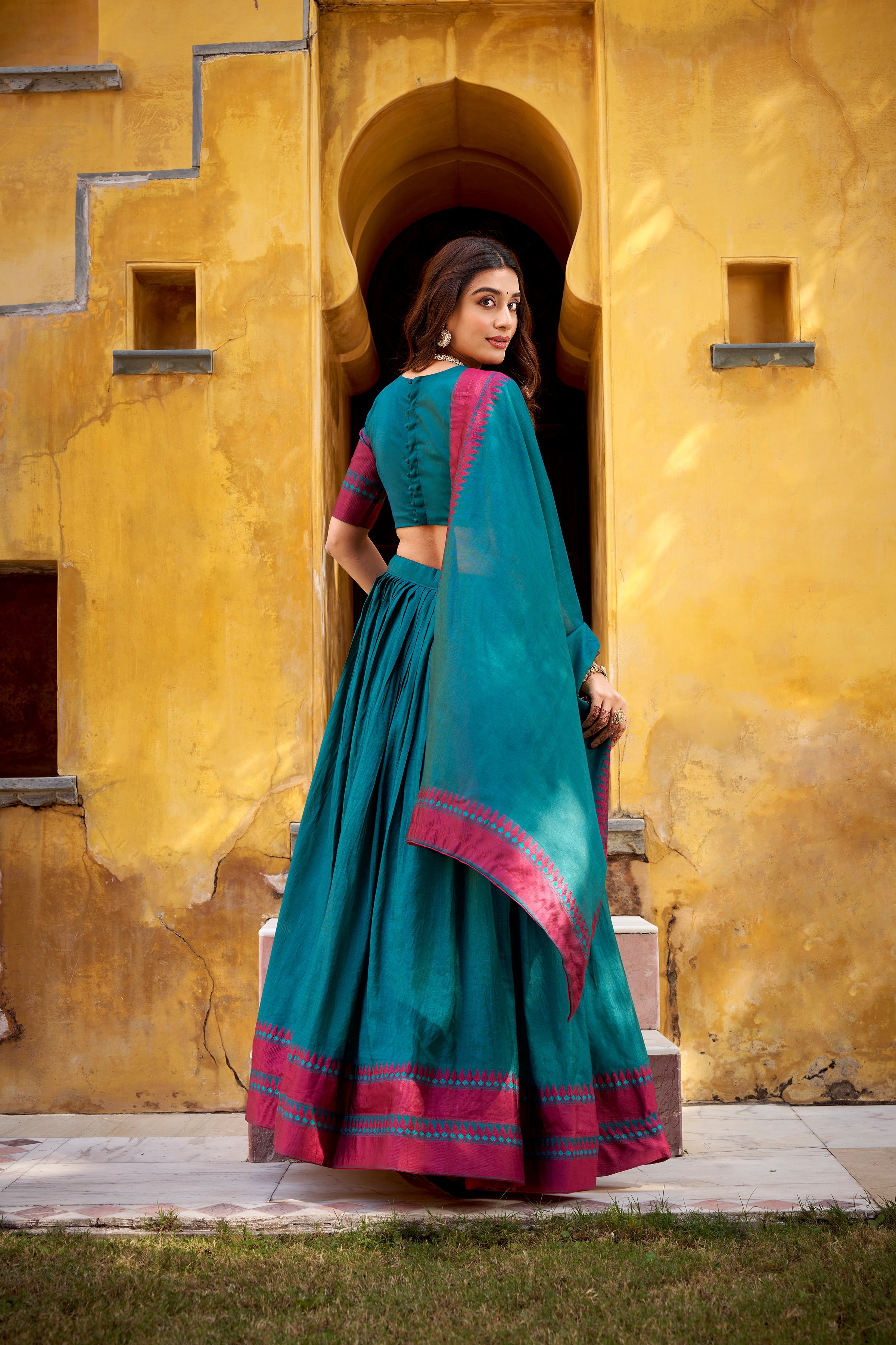 Swastika teal blue pure Chanderi thread work half saree lehenga