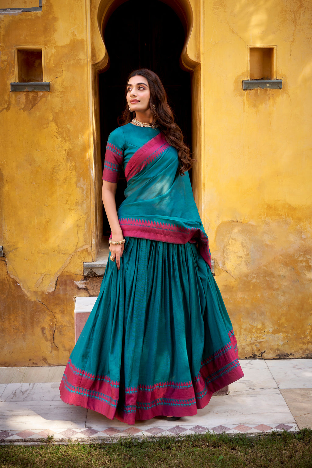 Swastika teal blue pure Chanderi thread work half saree lehenga
