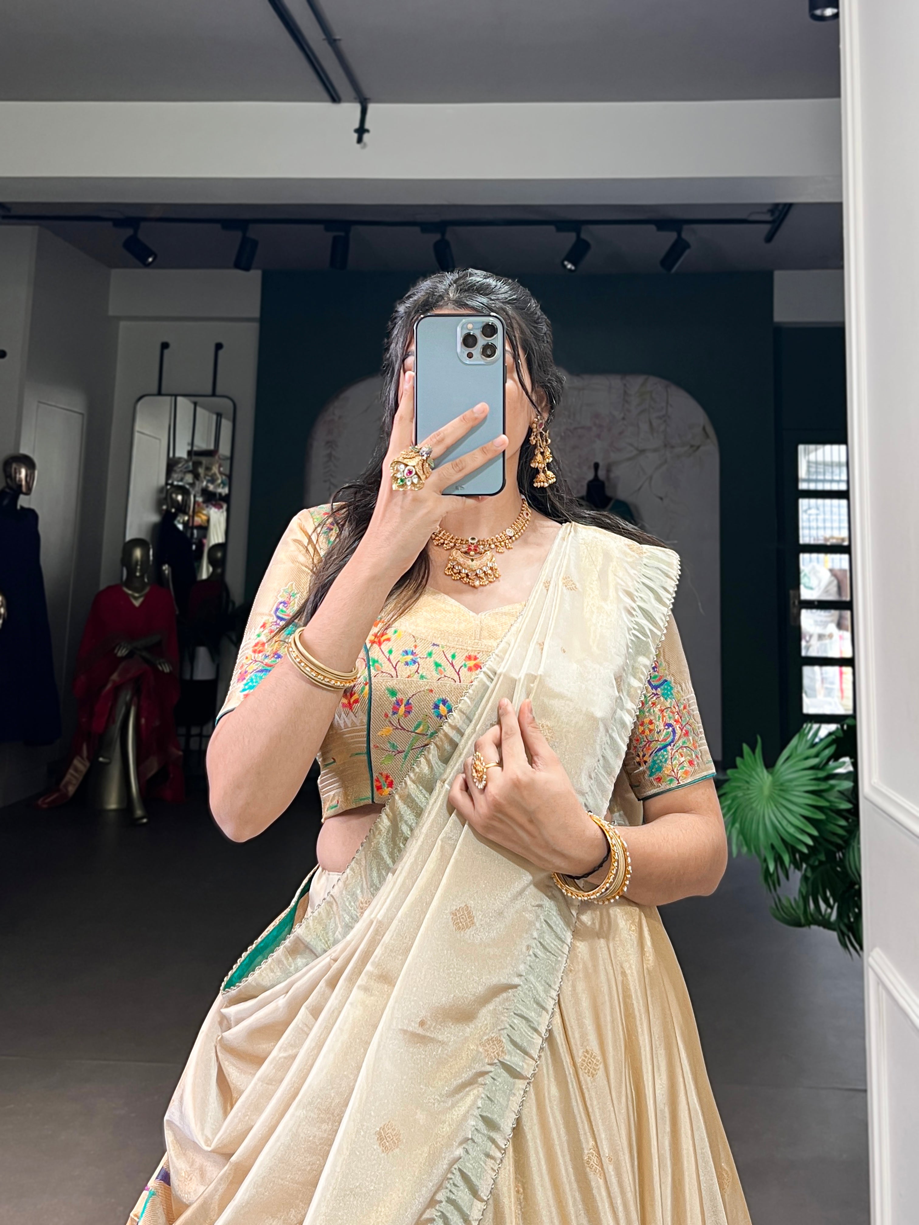 Kalyani cream shimmer Paithani zari weaving lehenga choli with green border and dupatta