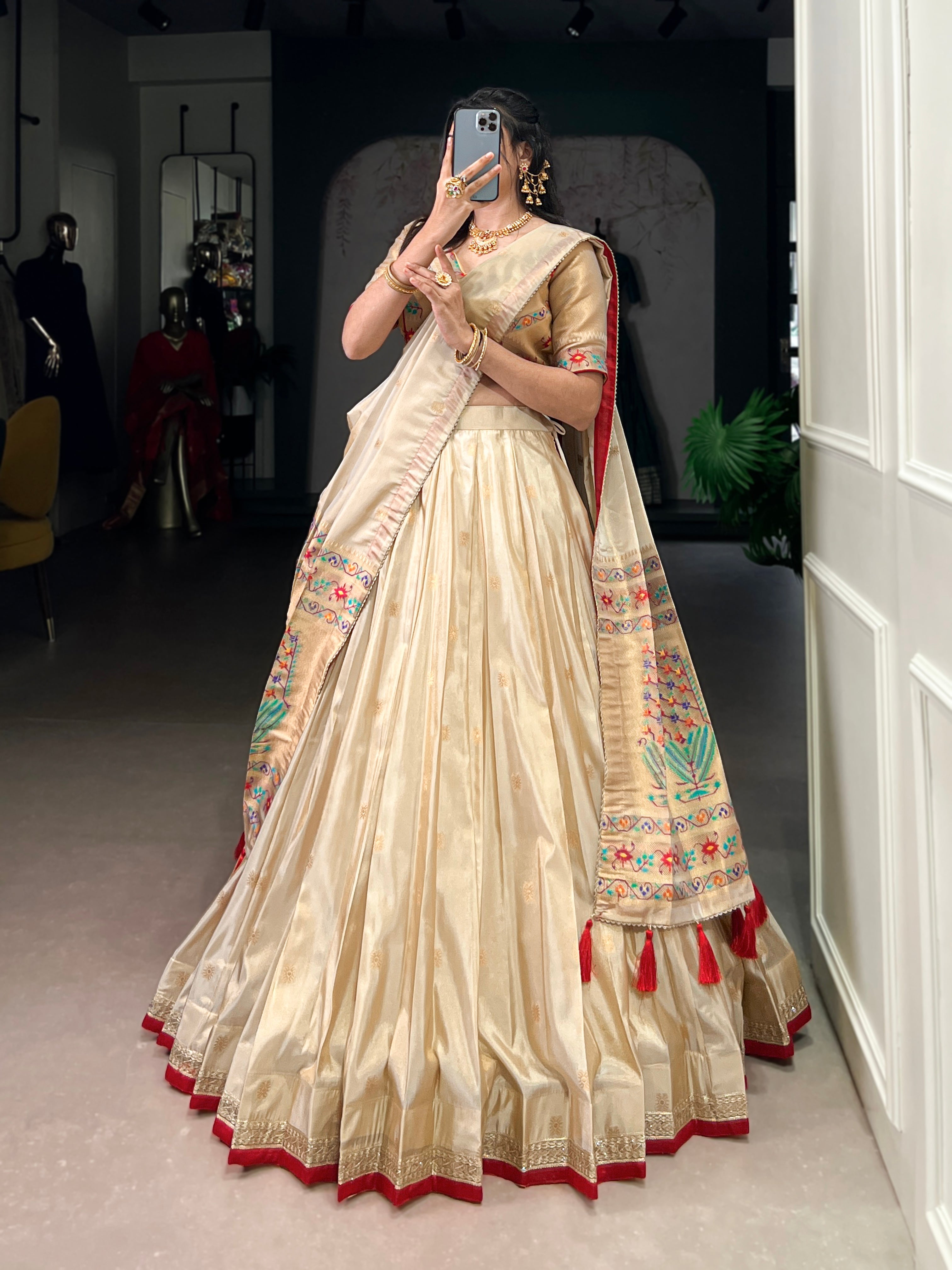 Kalyani cream shimmer Paithani zari weaving lehenga choli with red border and dupatta
