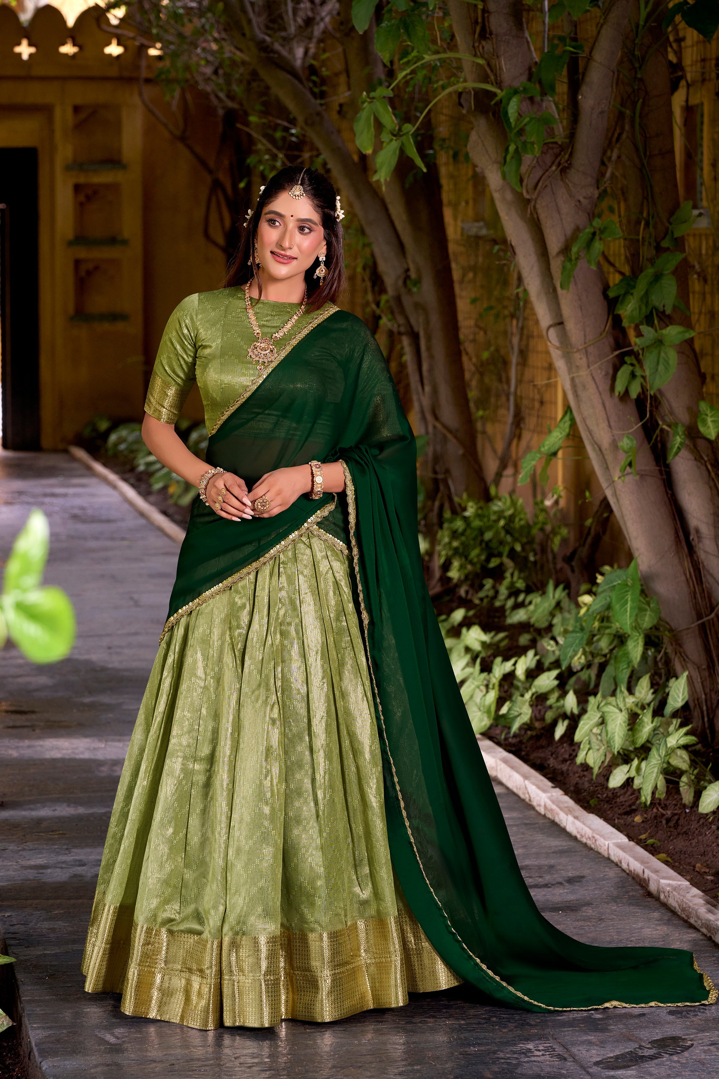 Suvarna pista green dupion silk half saree lehenga with zari weaving work