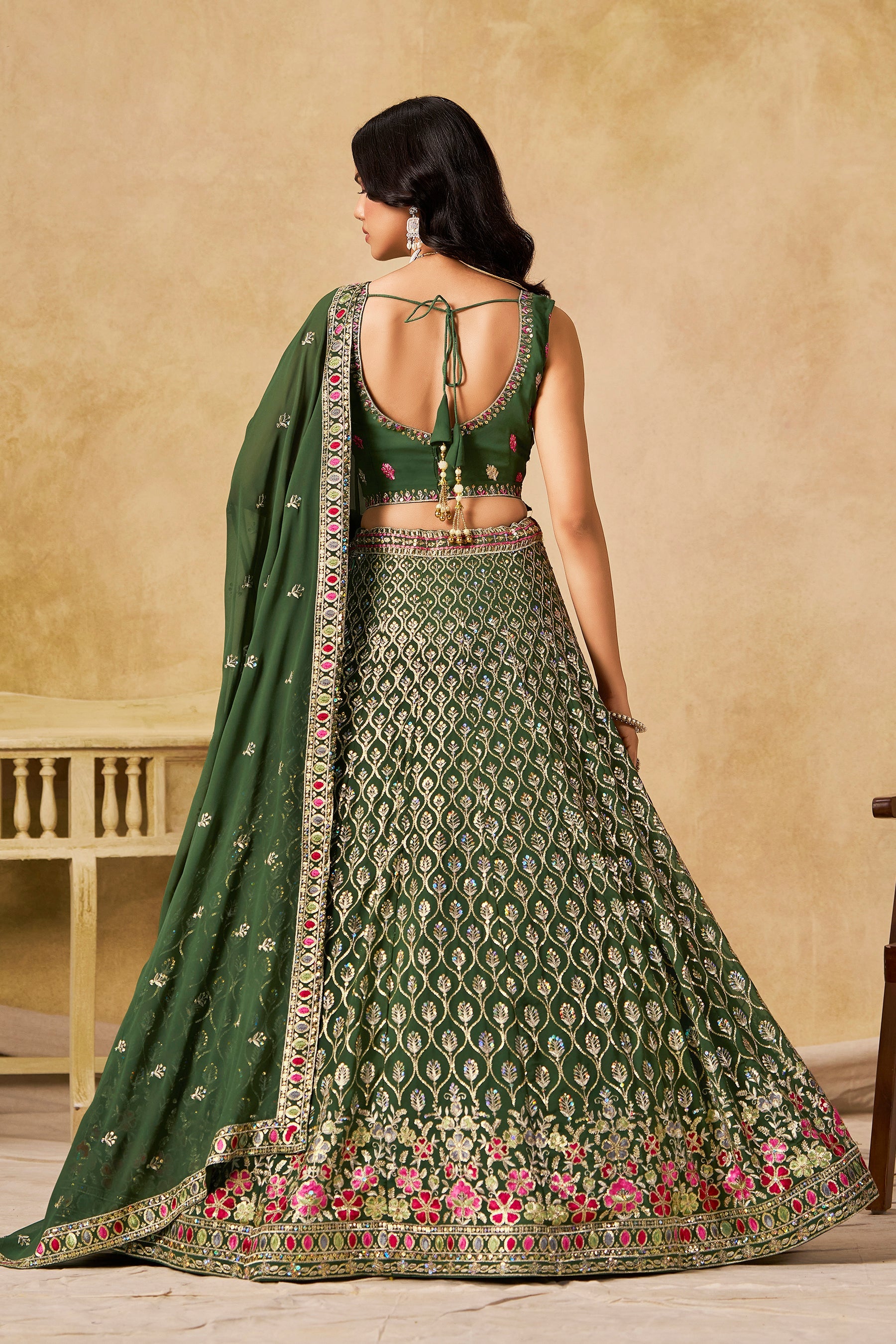 Sakhi green soft georgette lehenga choli with sequins zari resham and badla embroidery work