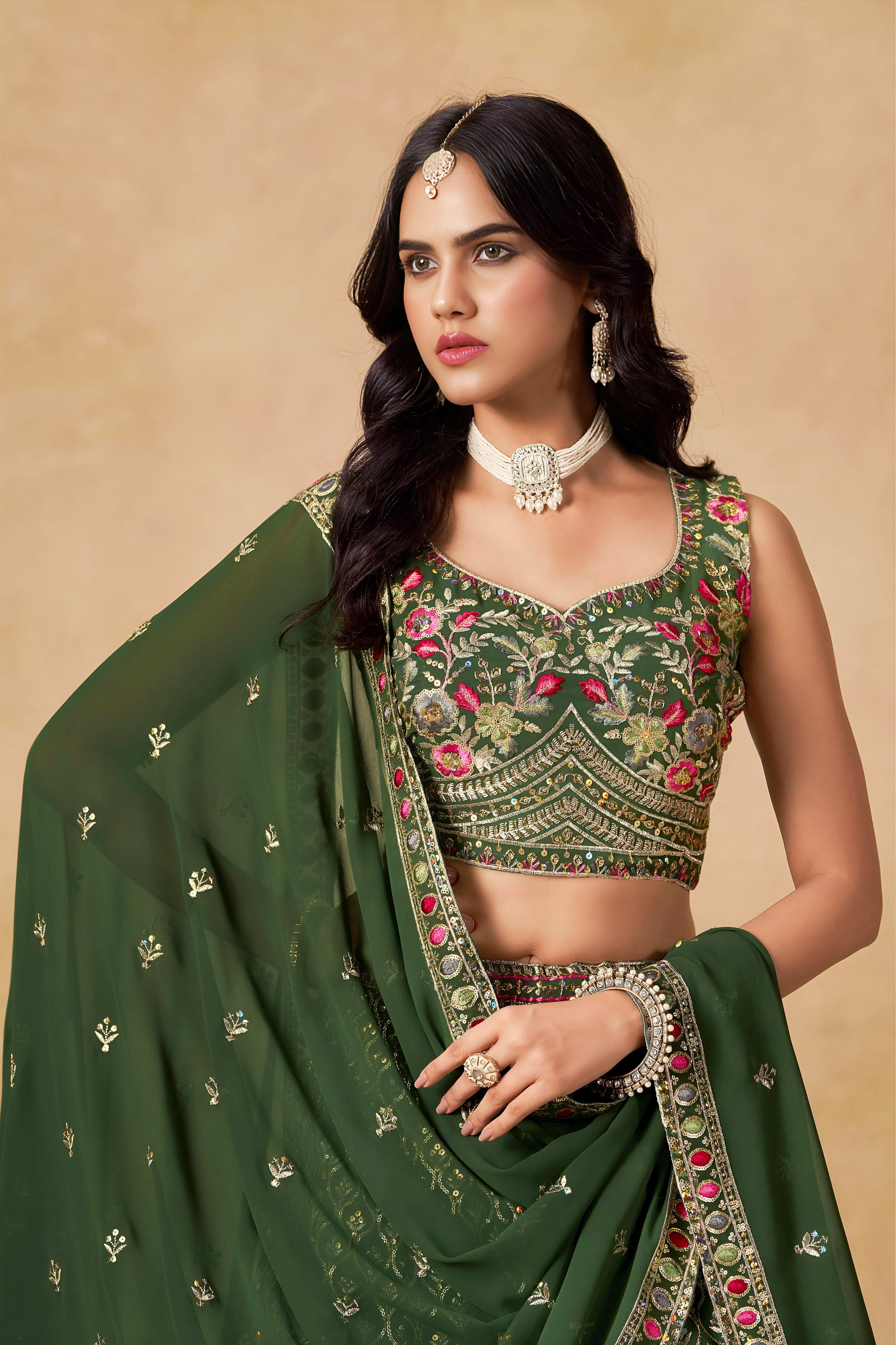 Sakhi green soft georgette lehenga choli with sequins zari resham and badla embroidery work