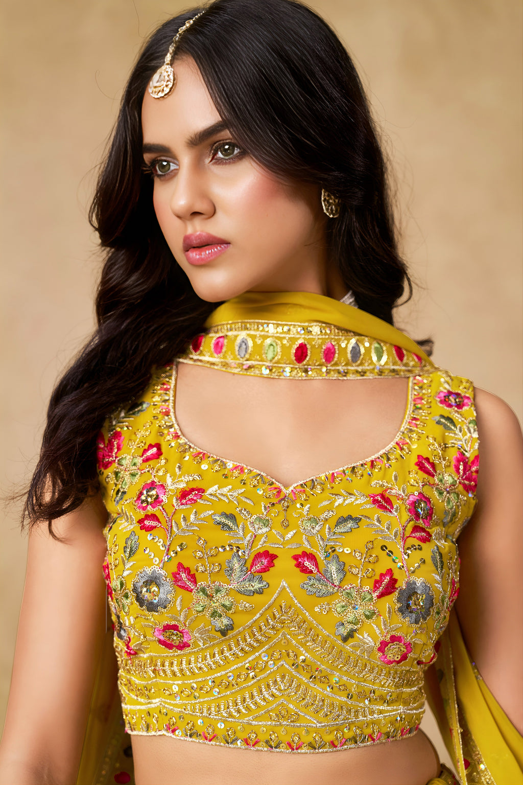 Sakhi yellow soft georgette lehenga choli with sequins zari resham and badla embroidery work