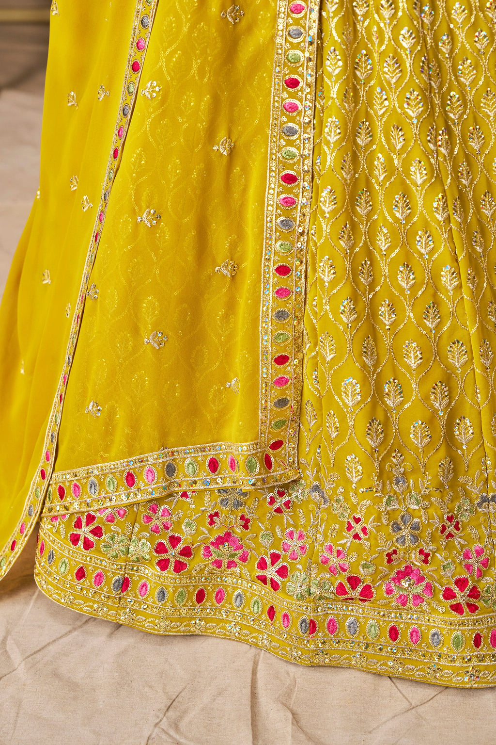 Sakhi yellow soft georgette lehenga choli with sequins zari resham and badla embroidery work
