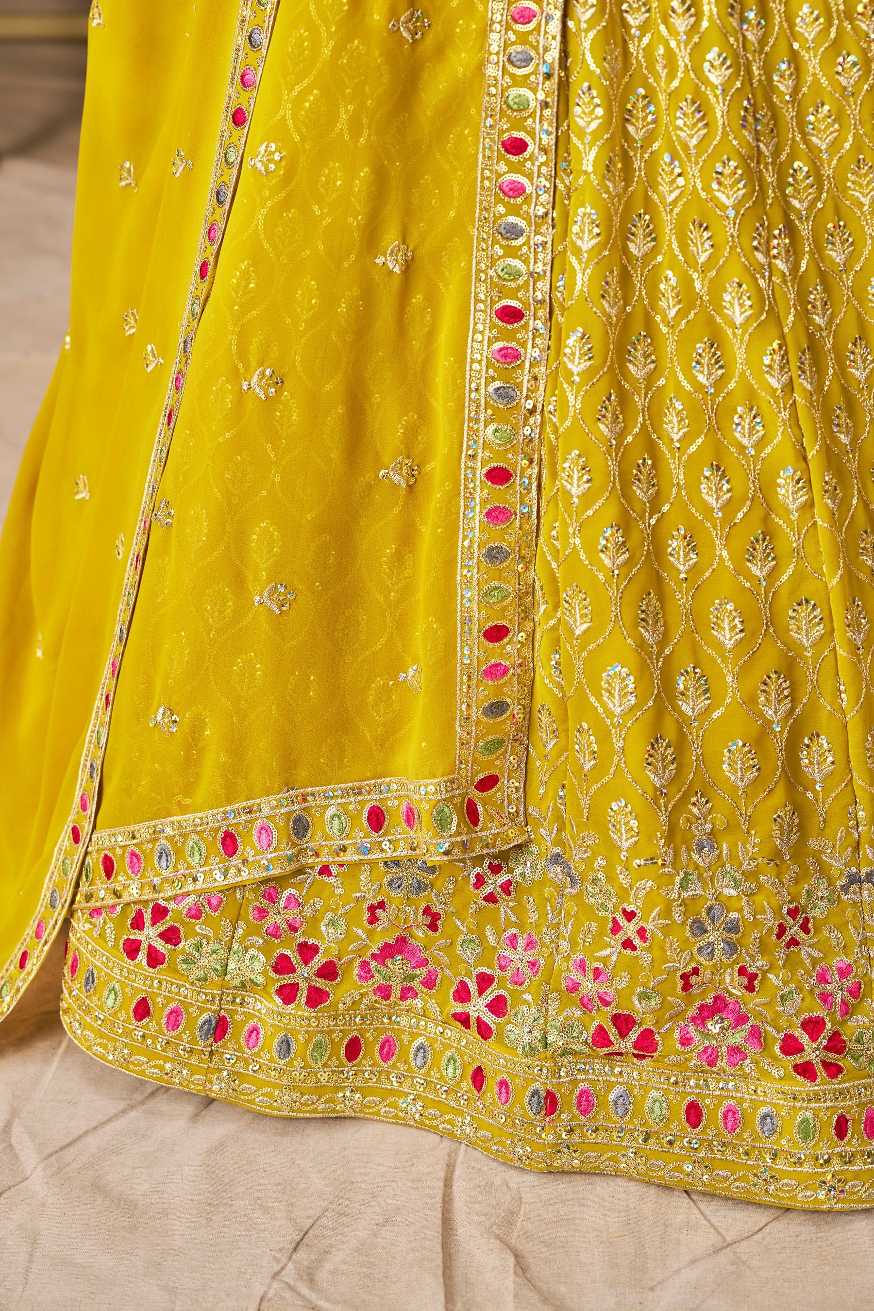 Sakhi yellow soft georgette lehenga choli with sequins zari resham and badla embroidery work