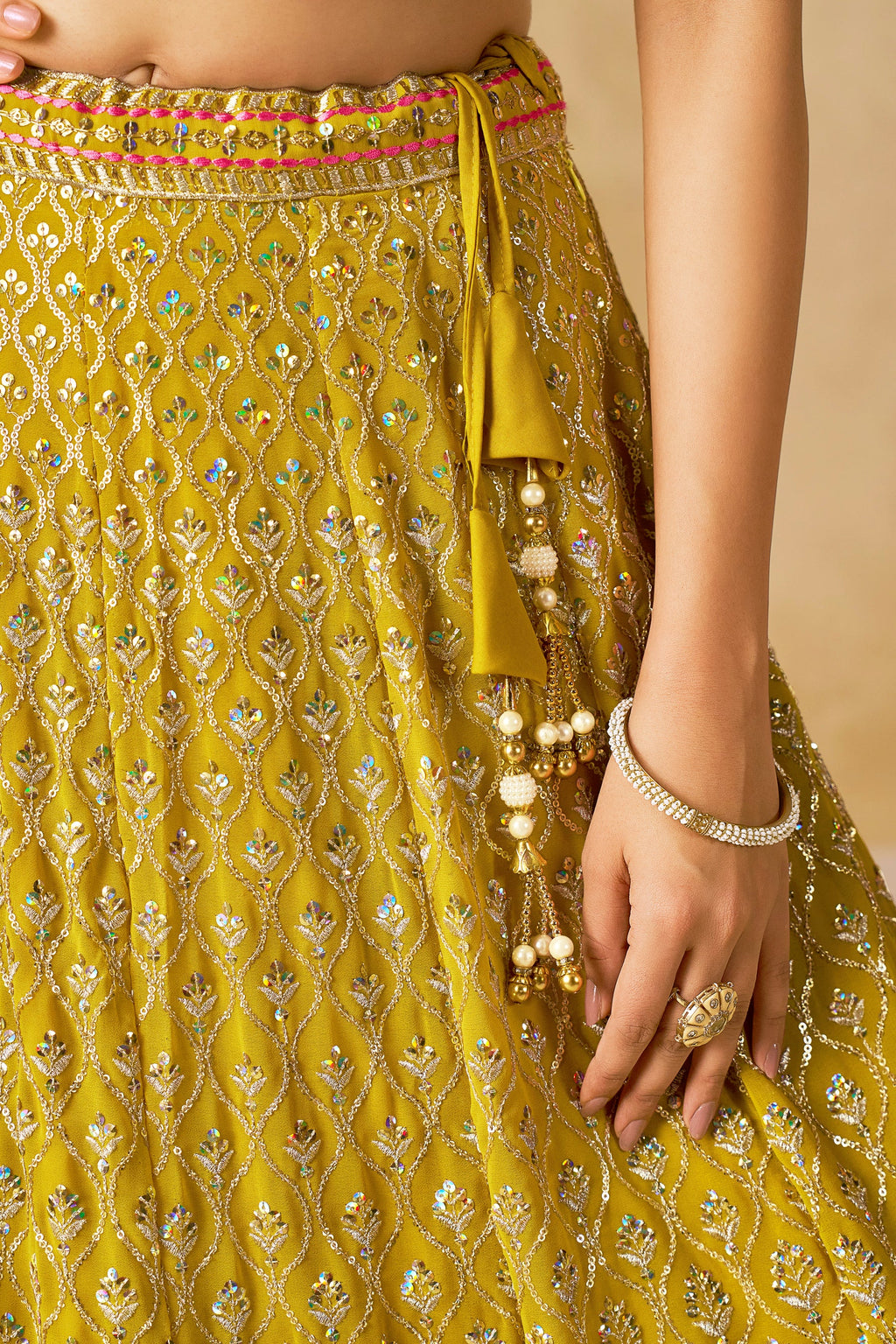 Sakhi yellow soft georgette lehenga choli with sequins zari resham and badla embroidery work