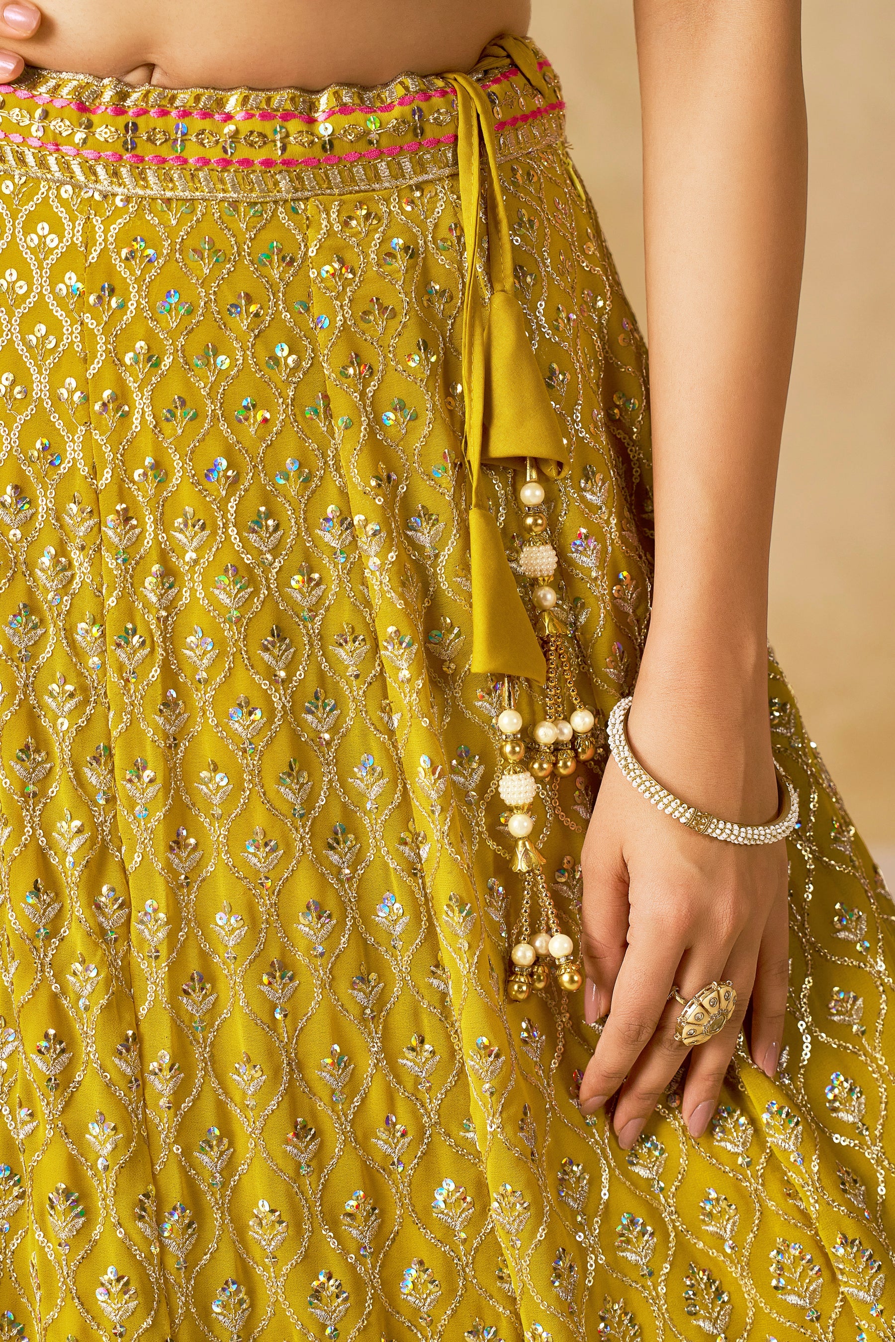 Sakhi yellow soft georgette lehenga choli with sequins zari resham and badla embroidery work