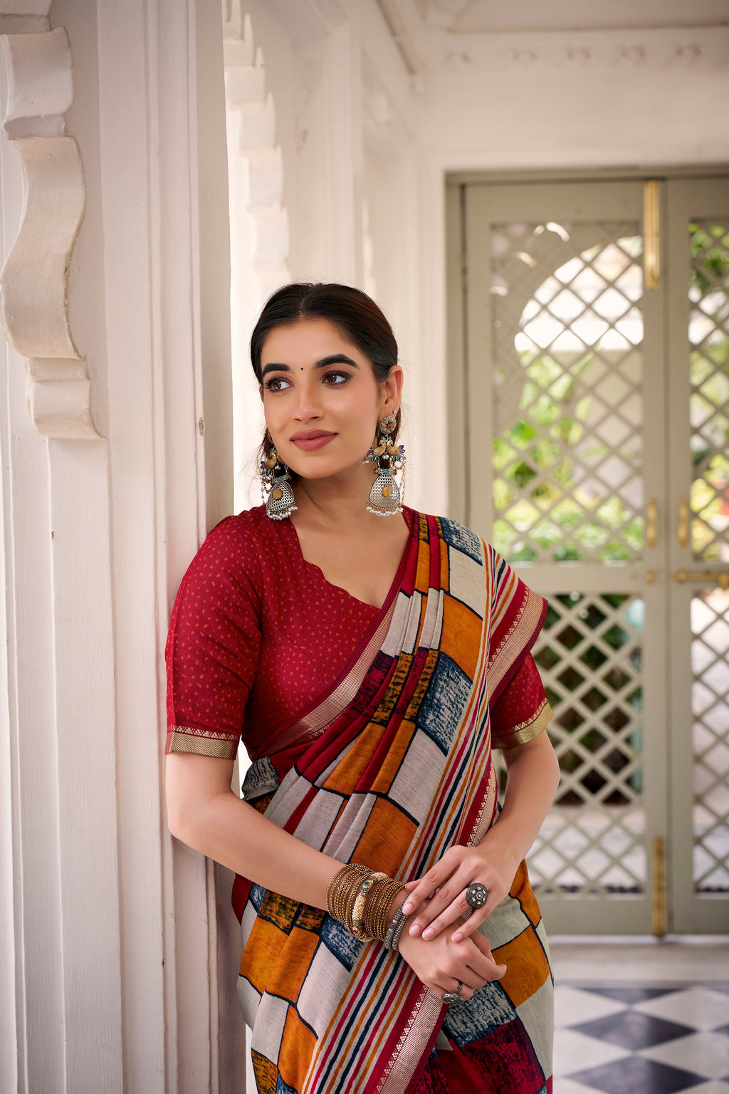 Maroon polyester viscose chanderi printed saree with unstitched blouse