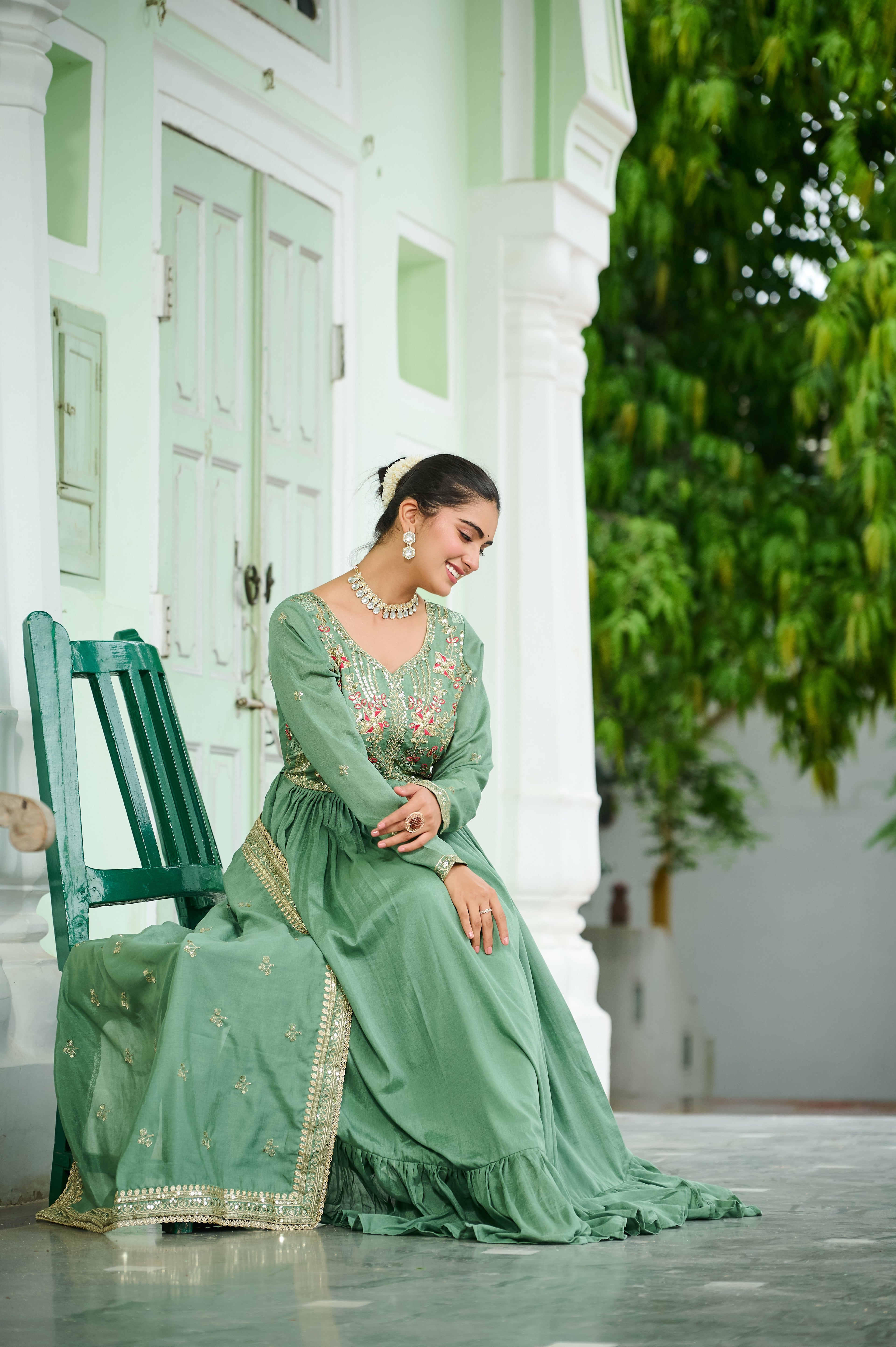 Bani pista green Vichitra silk embroidered zari thread work gown with dupatta