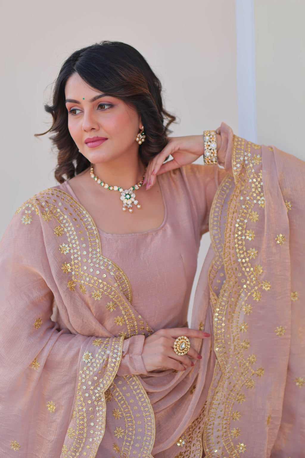 Bhargavi Peach Gown Set – Fendy chiffon gown with 12 kali stitching and 3.5 meter flair, full sleeves, cotton lining, and canvas patta; paired with a sequin and zari embroidered cut-work dupatta – perfect for weddings, sangeet, and festive celebrations.