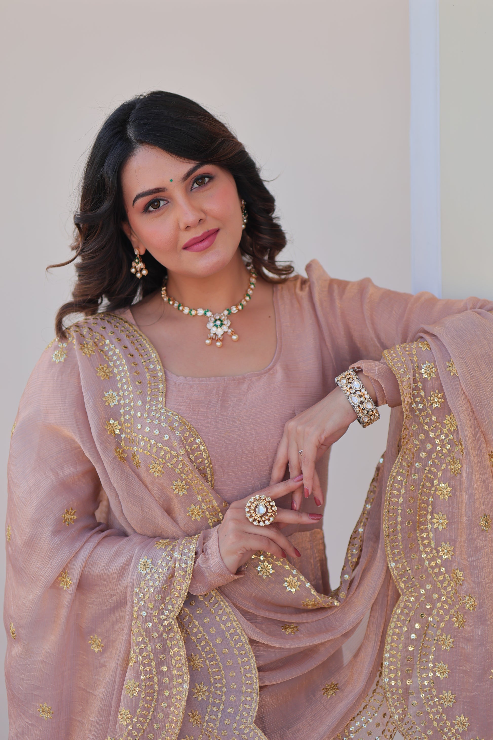 Bhargavi Peach Gown Set – Fendy chiffon gown with 12 kali stitching and 3.5 meter flair, full sleeves, cotton lining, and canvas patta; paired with a sequin and zari embroidered cut-work dupatta – perfect for weddings, sangeet, and festive celebrations.
