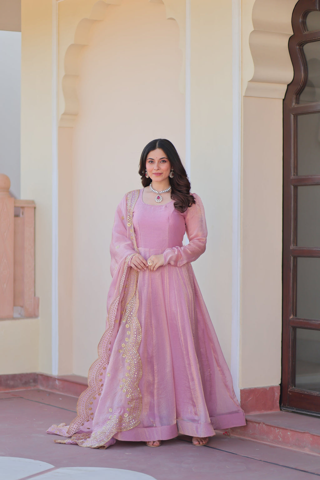 Bhargavi Pink Gown Set – Fendy chiffon gown with 12 kali stitching, full sleeves, and 3.5 meter flair; paired with a sequins and zari embroidered cut-work chiffon dupatta – ideal for weddings, sangeet, and festive occasions.