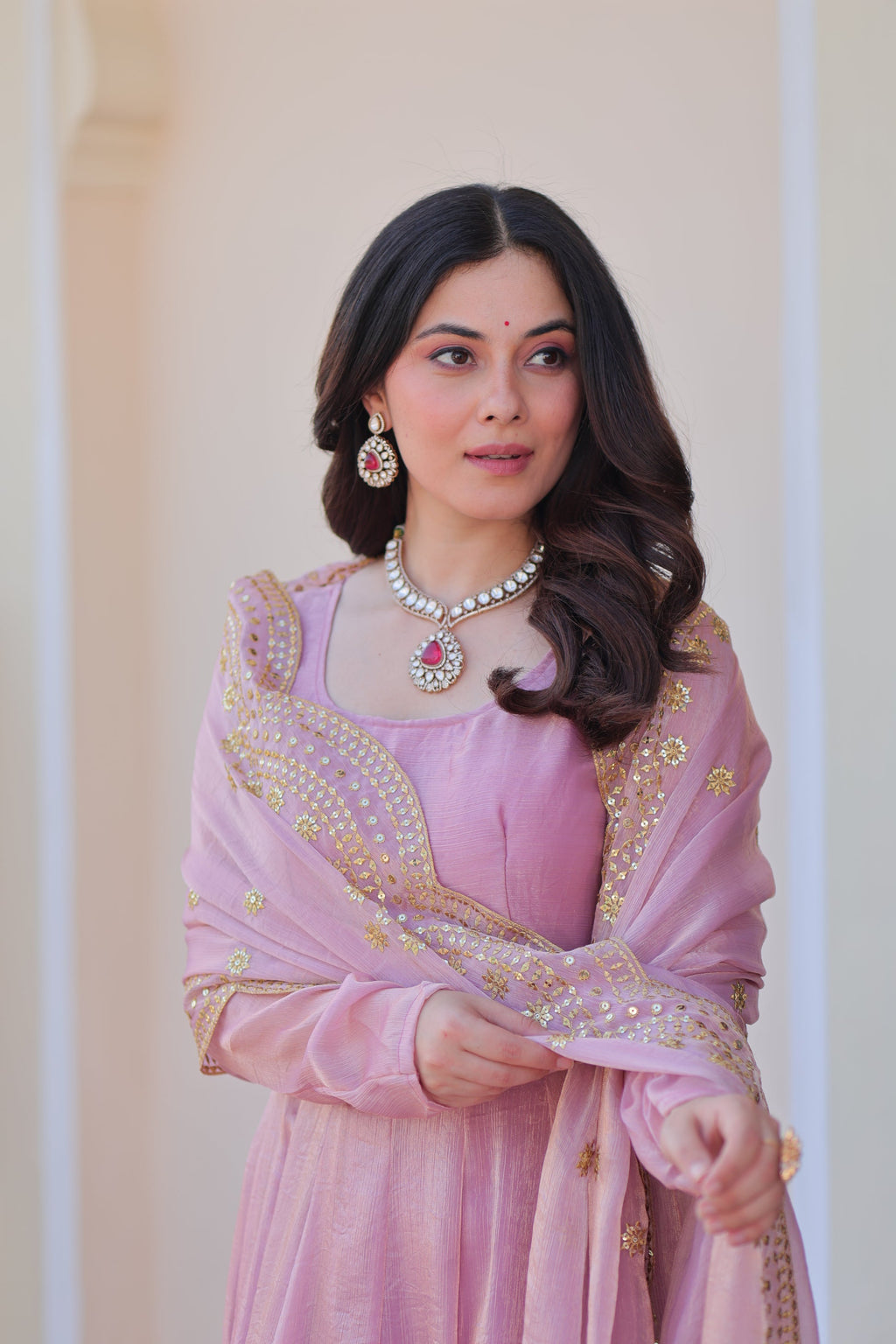 Bhargavi Pink Gown Set – Fendy chiffon gown with 12 kali stitching, full sleeves, and 3.5 meter flair; paired with a sequins and zari embroidered cut-work chiffon dupatta – ideal for weddings, sangeet, and festive occasions.