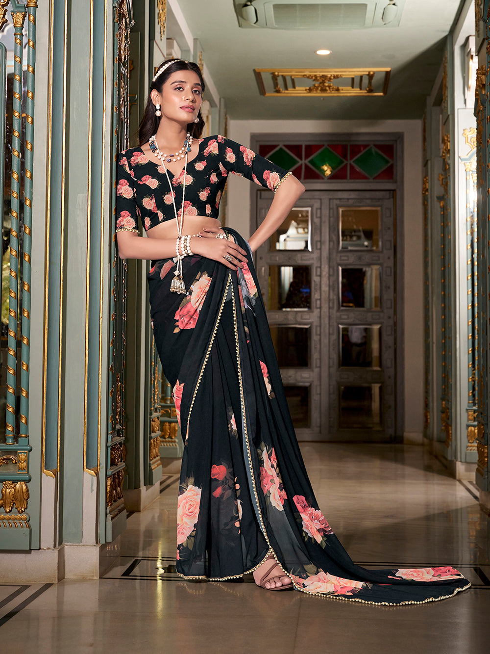 Black georgette printed saree with pearl lace border