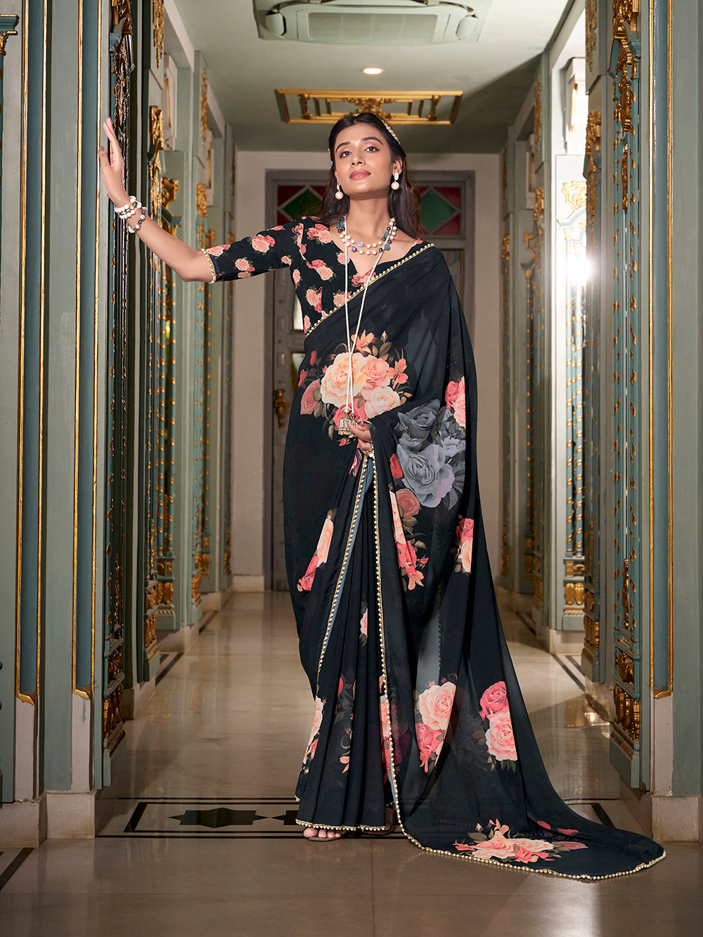 Black georgette printed saree with pearl lace border