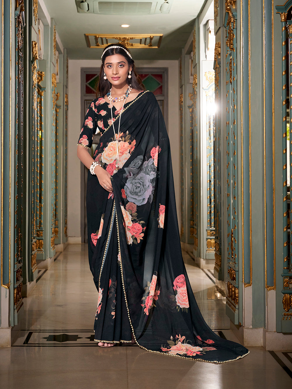 Black georgette printed saree with pearl lace border