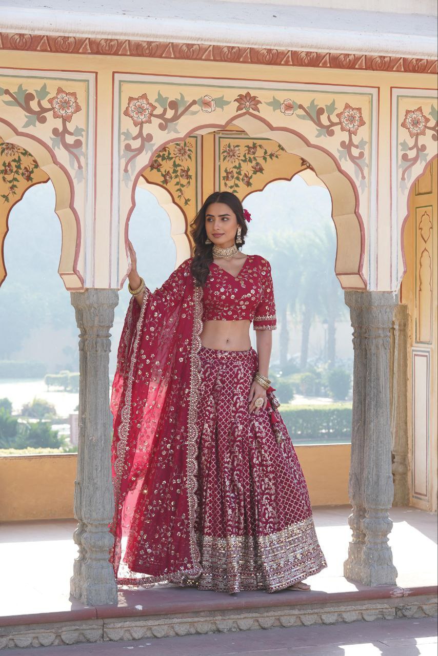 Kaushiki red embroidered lehenga set