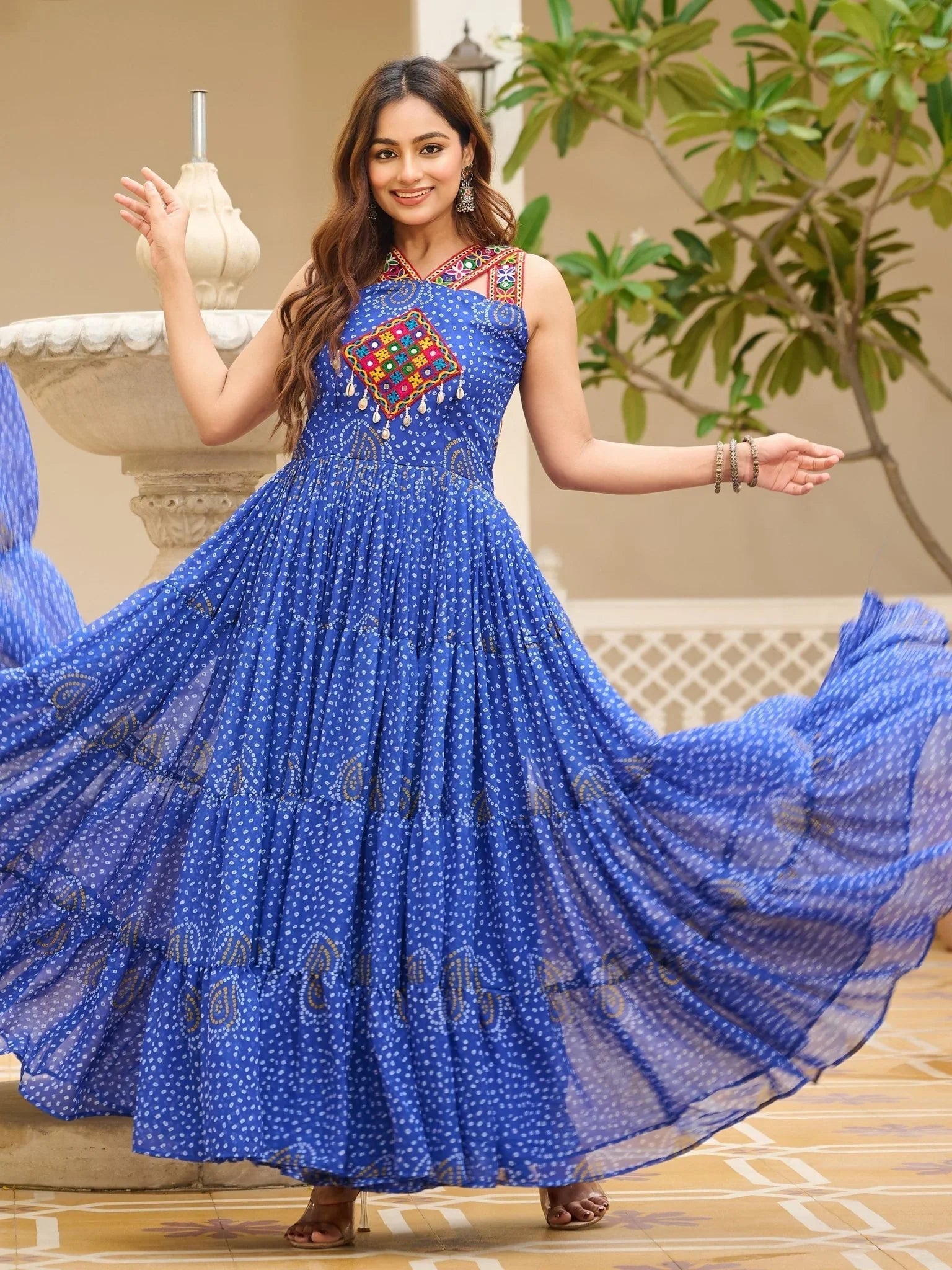 Blue Bandhani print gown with mirror and Gamthi embroidery
