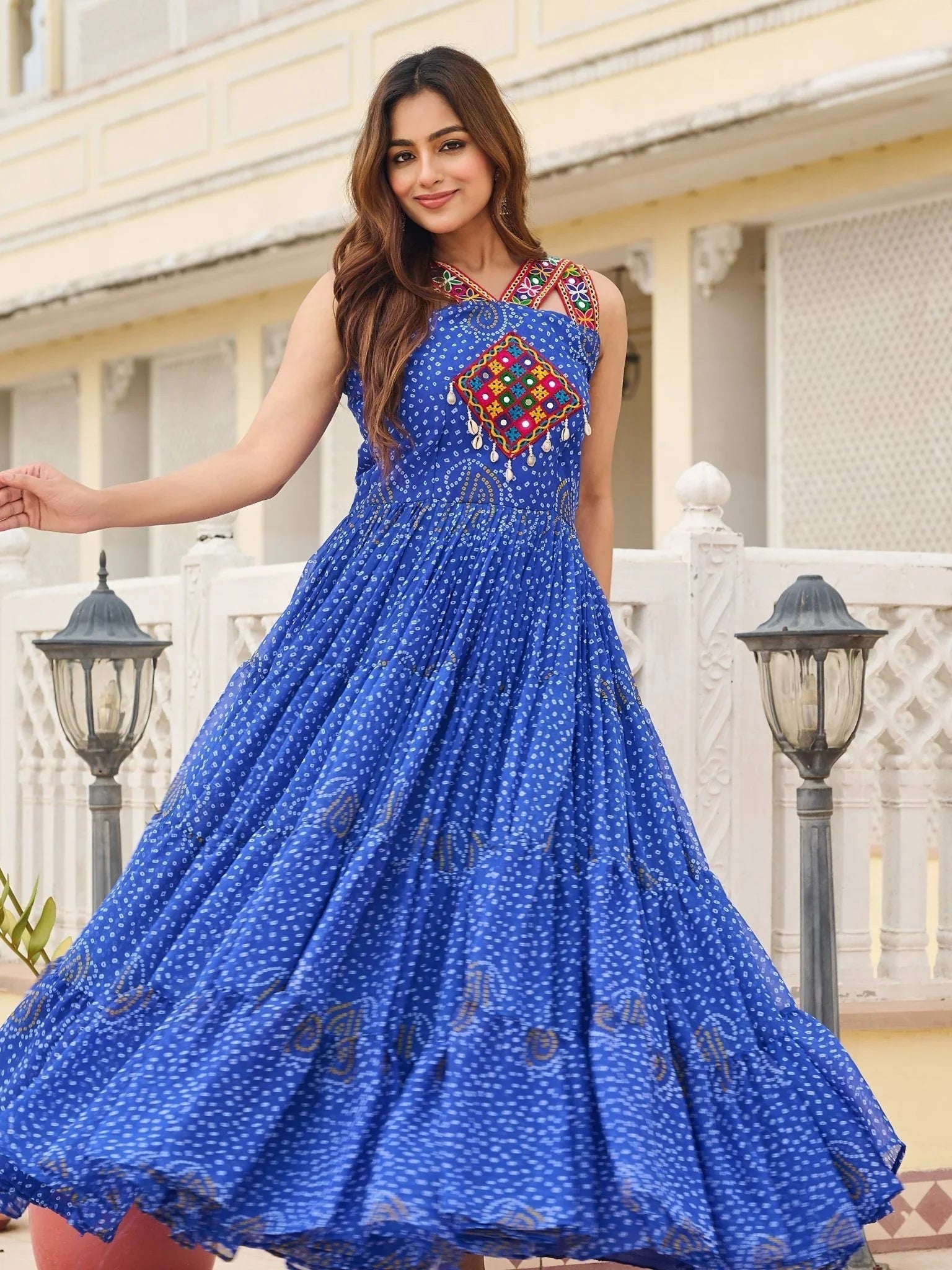 Blue Bandhani print gown with mirror and Gamthi embroidery