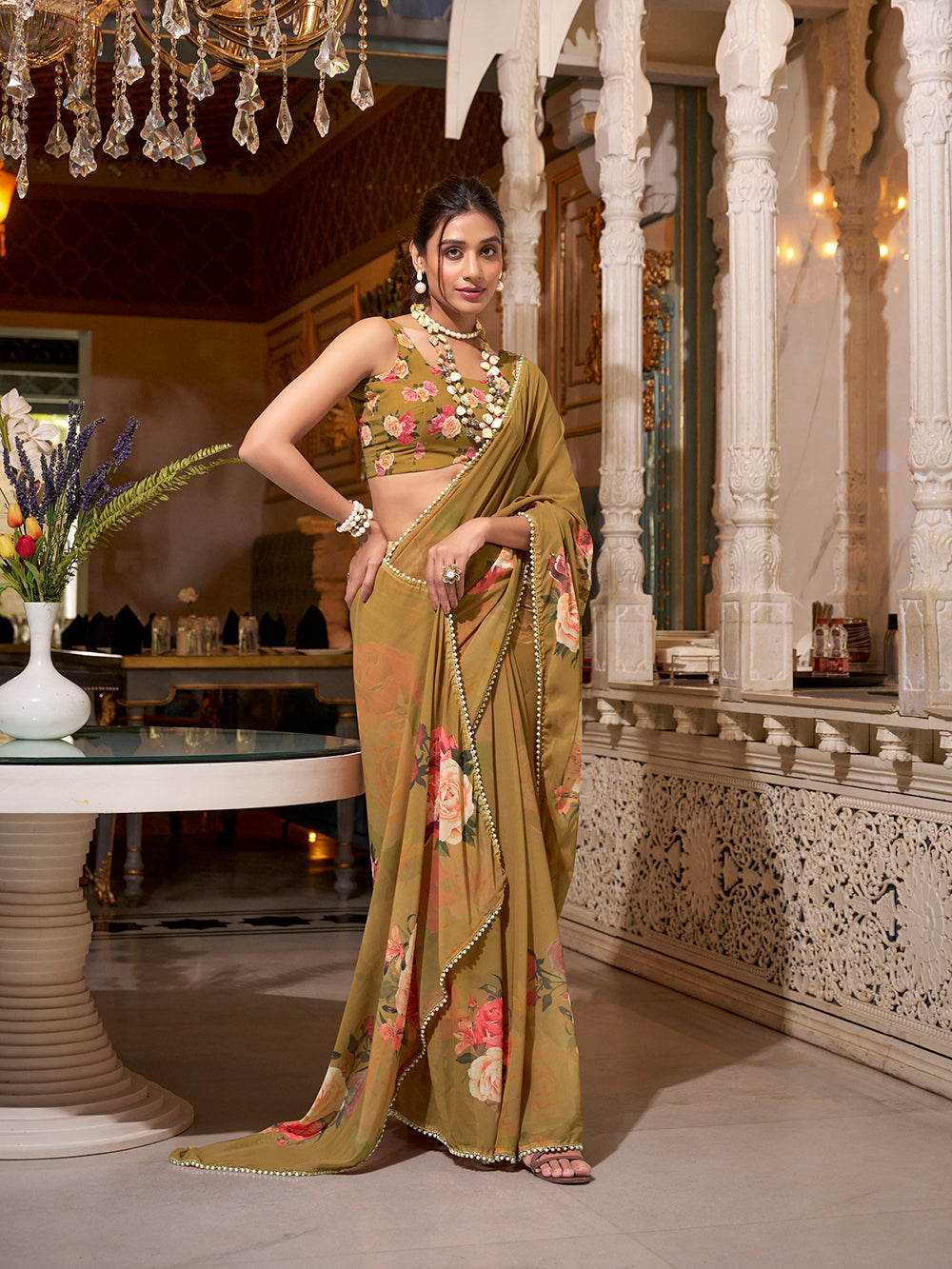 Brown georgette printed saree with pearl lace border