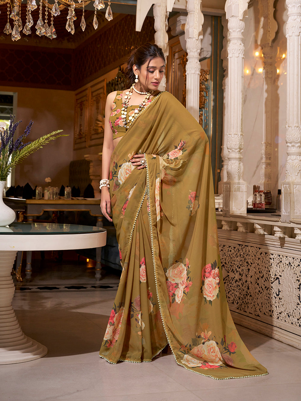 Brown georgette printed saree with pearl lace border