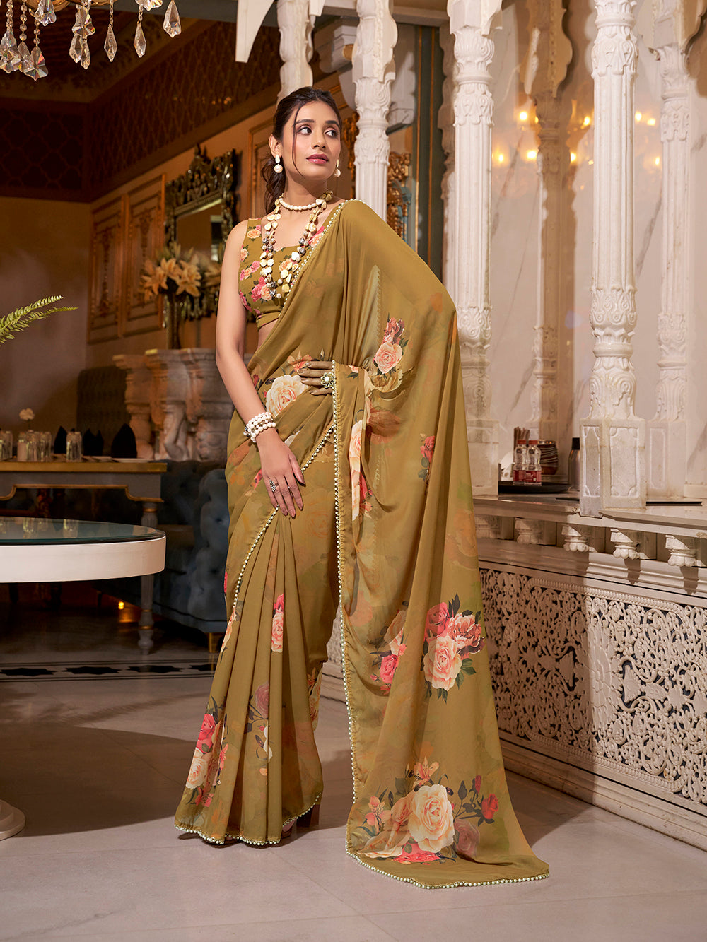 Brown georgette printed saree with pearl lace border
