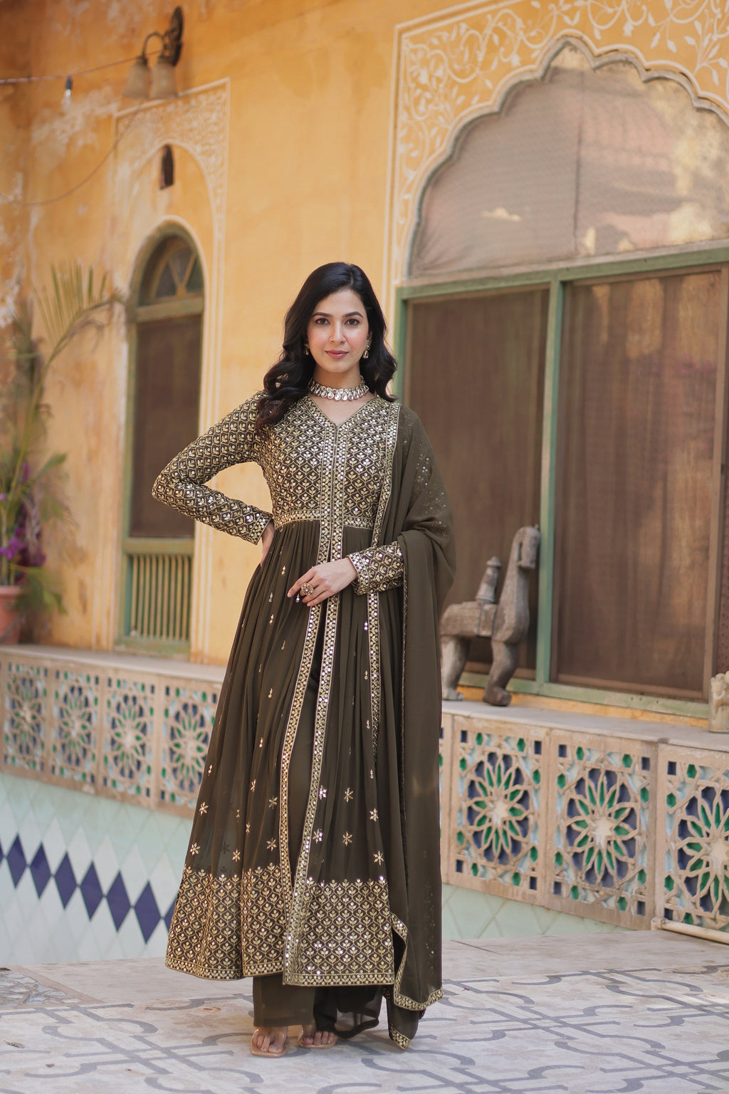 Deeshna mehndi green embroidered anarkali gown set