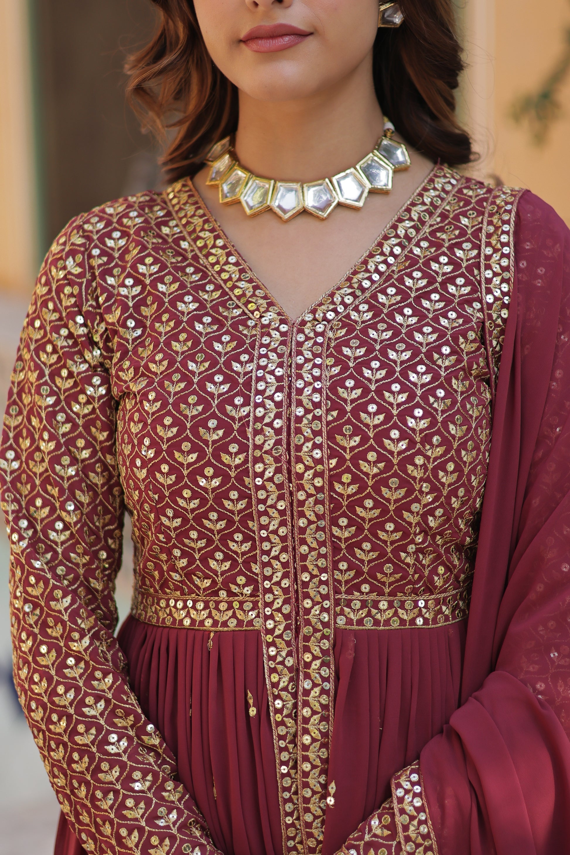 Deeshna peach embroidered anarkali gown set
