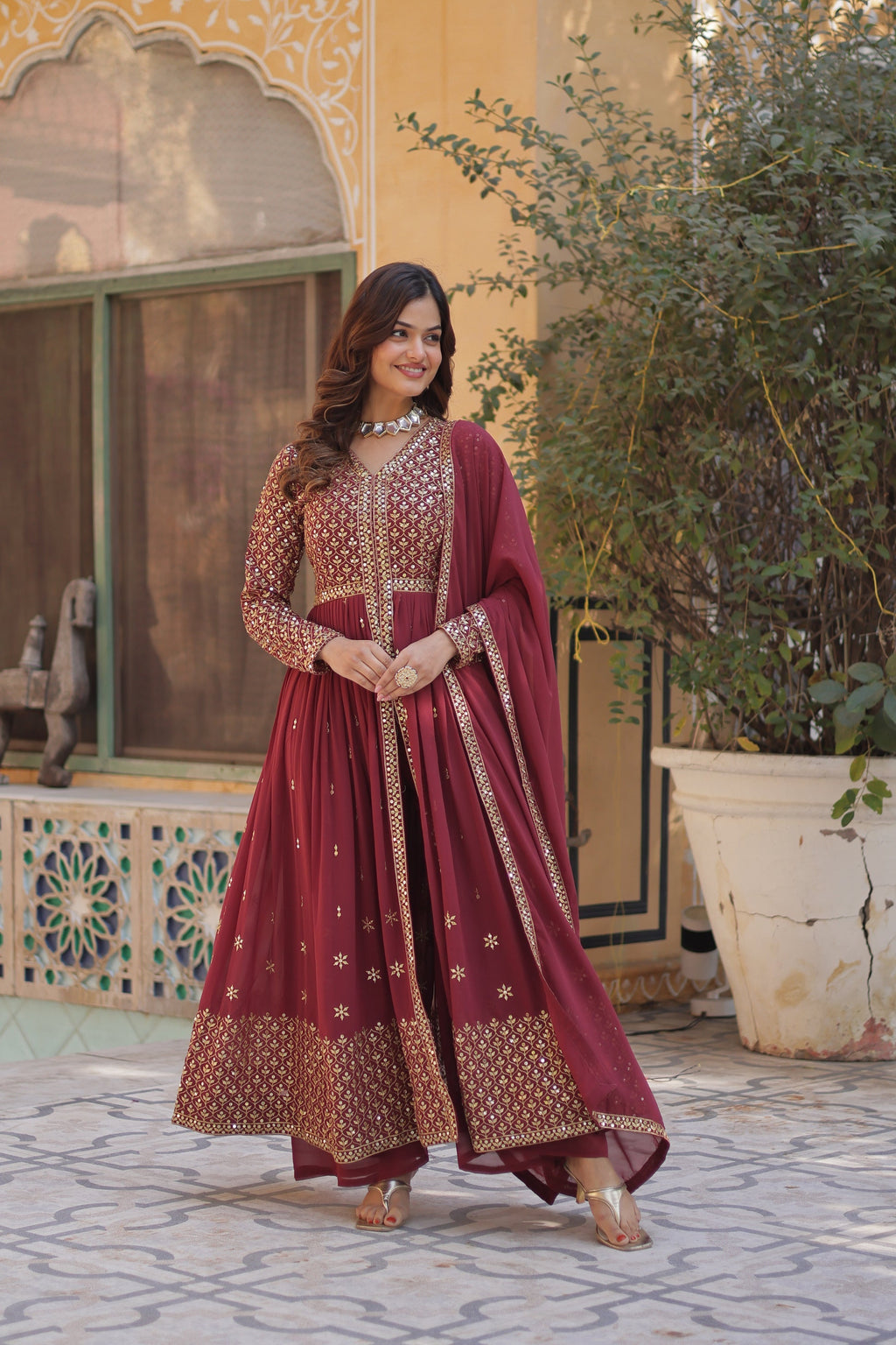 Deeshna peach embroidered anarkali gown set