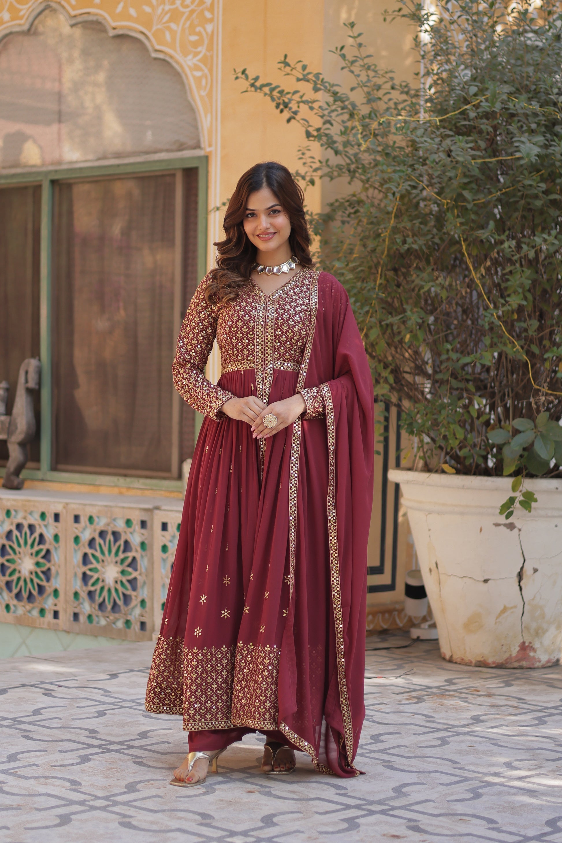 Deeshna peach embroidered anarkali gown set