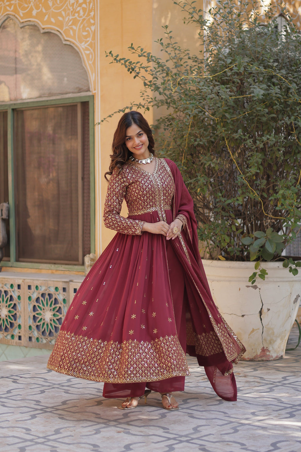 Deeshna peach embroidered anarkali gown set