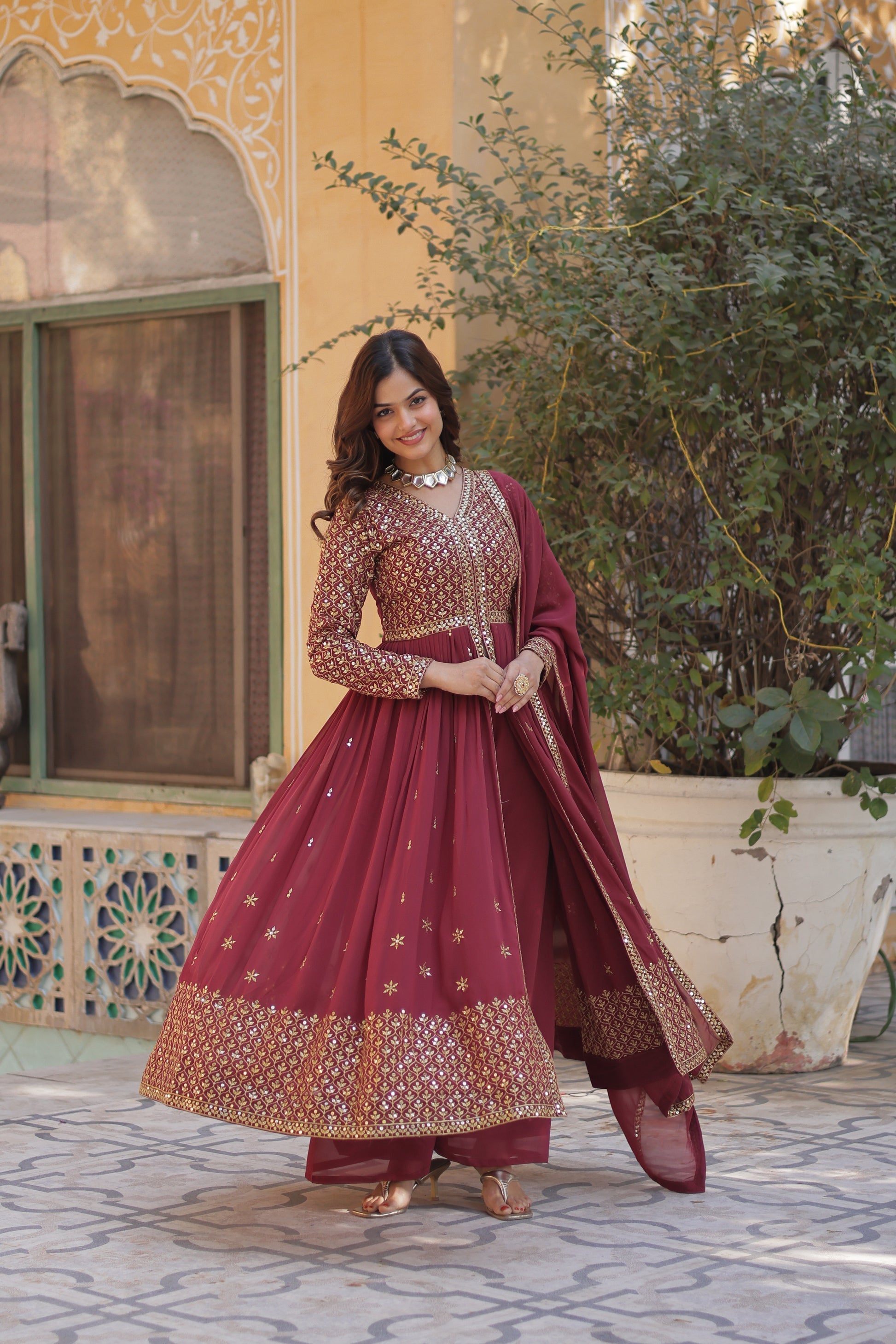 Deeshna peach embroidered anarkali gown set
