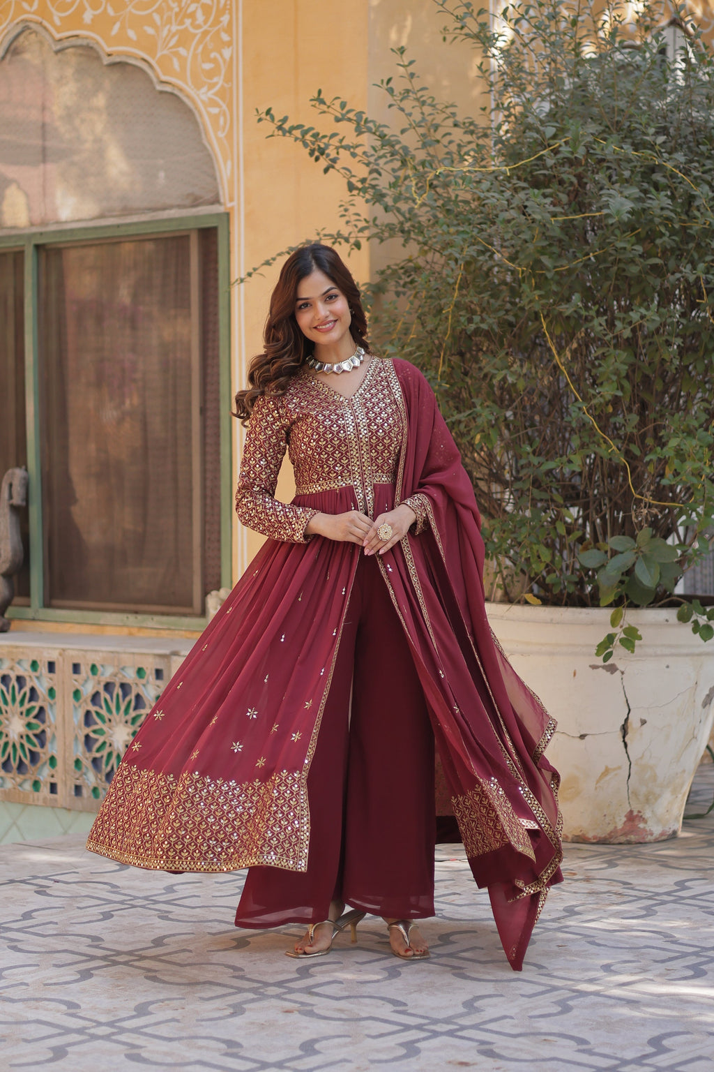 Deeshna peach embroidered anarkali gown set