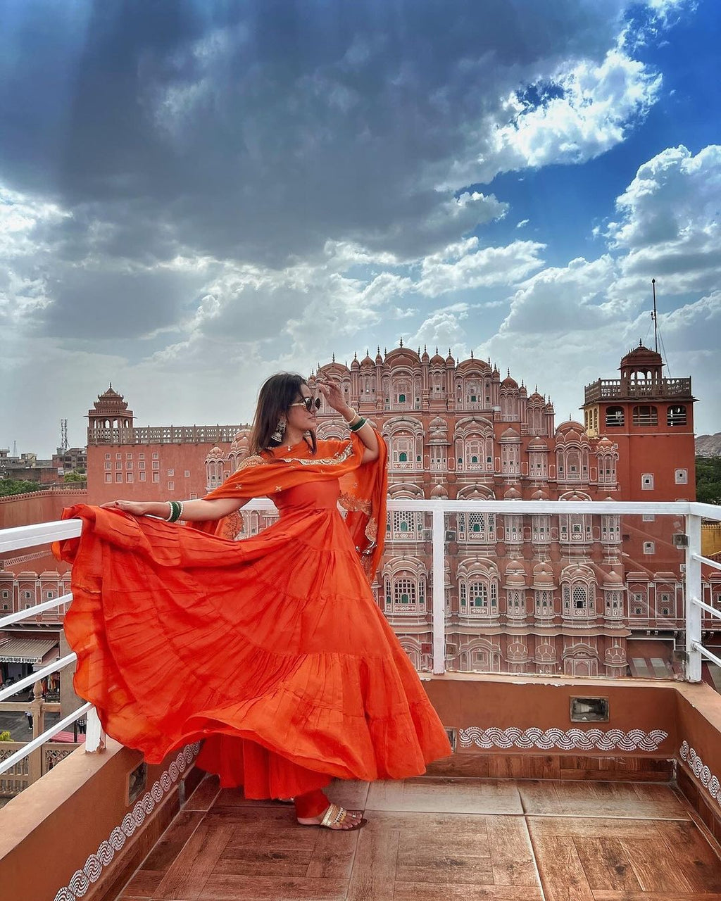 Devayani orange georgette anarkali gown set