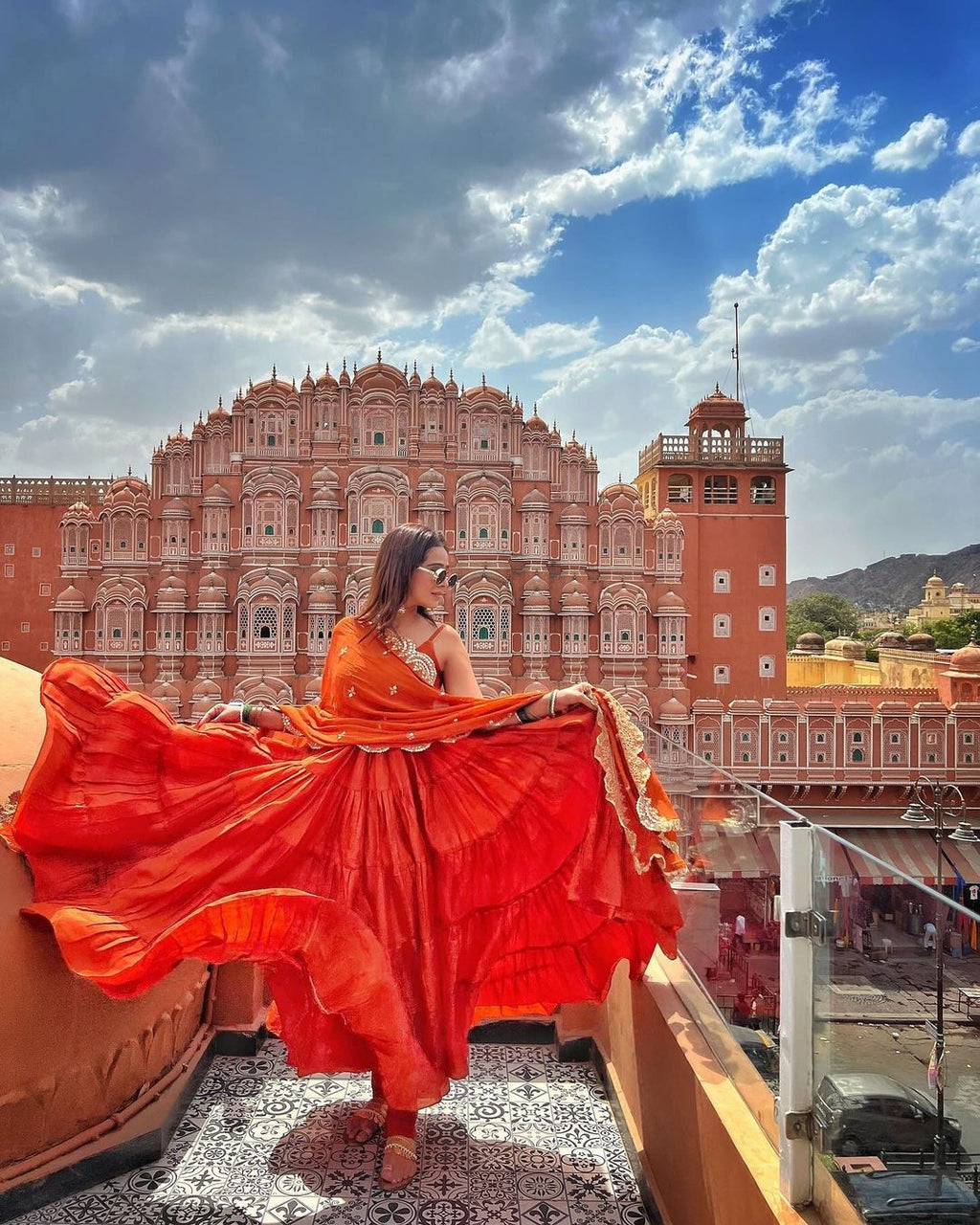 Devayani orange georgette anarkali gown set