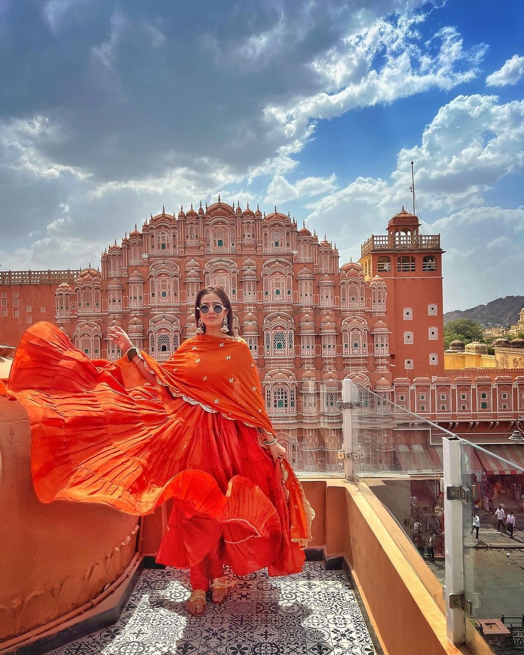 Devayani orange georgette anarkali gown set