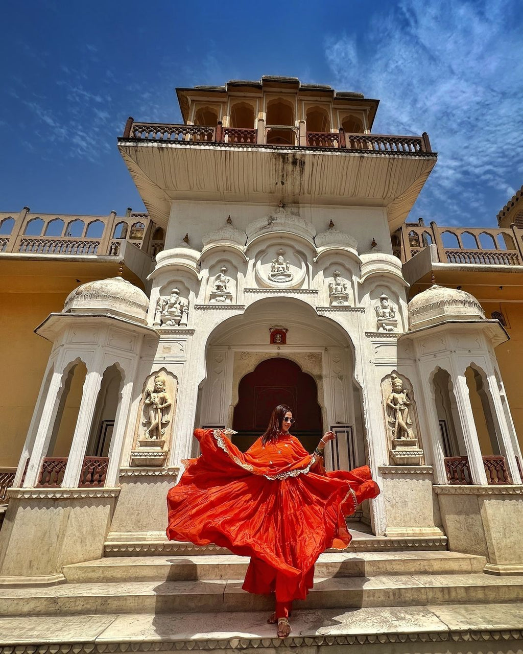 Devayani orange georgette anarkali gown set