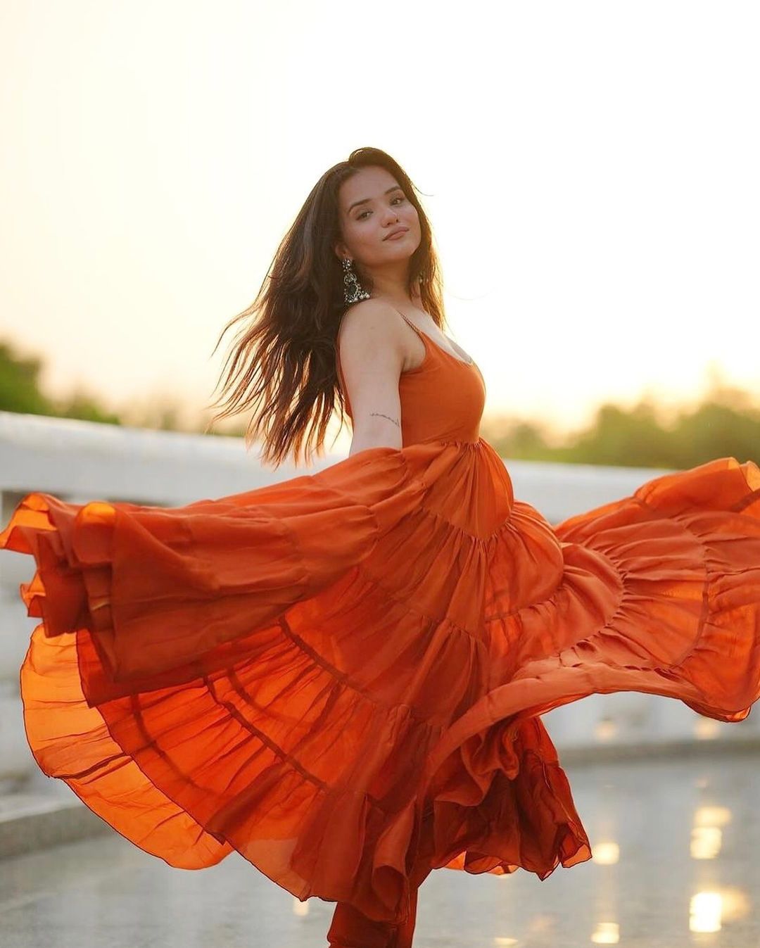Devayani orange georgette anarkali gown set