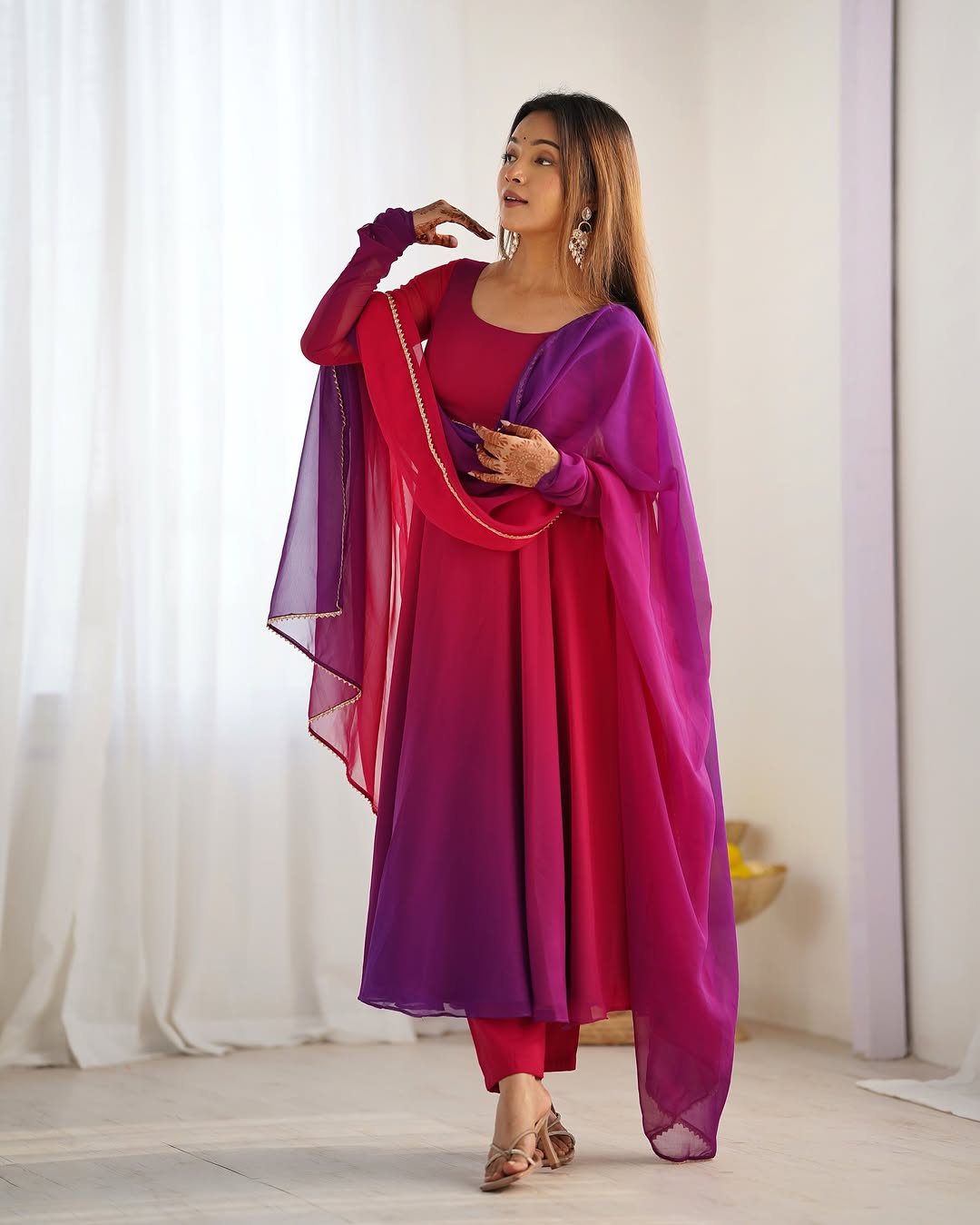 Dark pink georgette flared Devika designer Anarkali gown