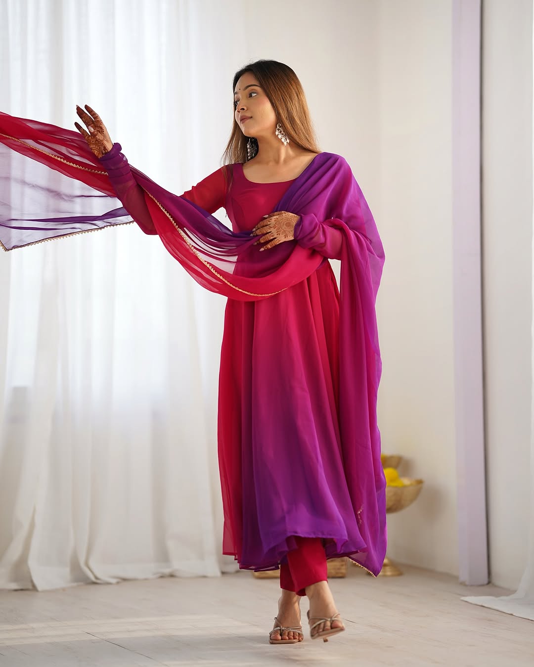 Dark pink georgette flared Devika designer Anarkali gown