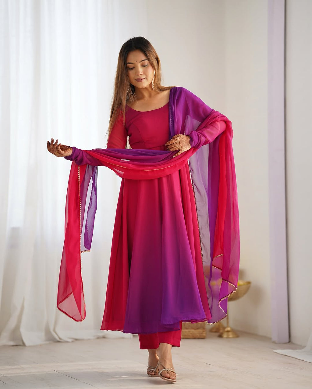 Dark pink georgette flared Devika designer Anarkali gown