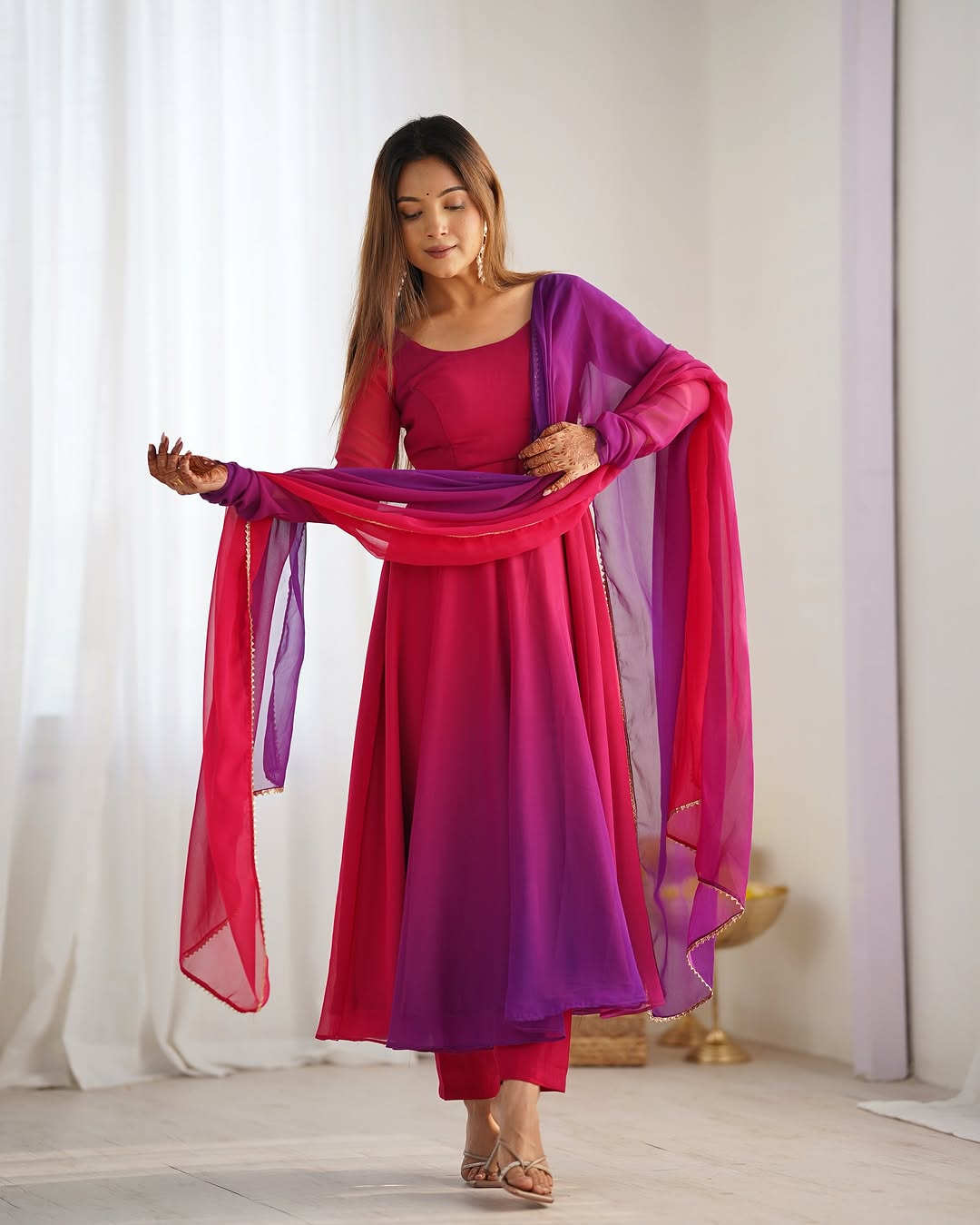 Dark pink georgette flared Devika designer Anarkali gown
