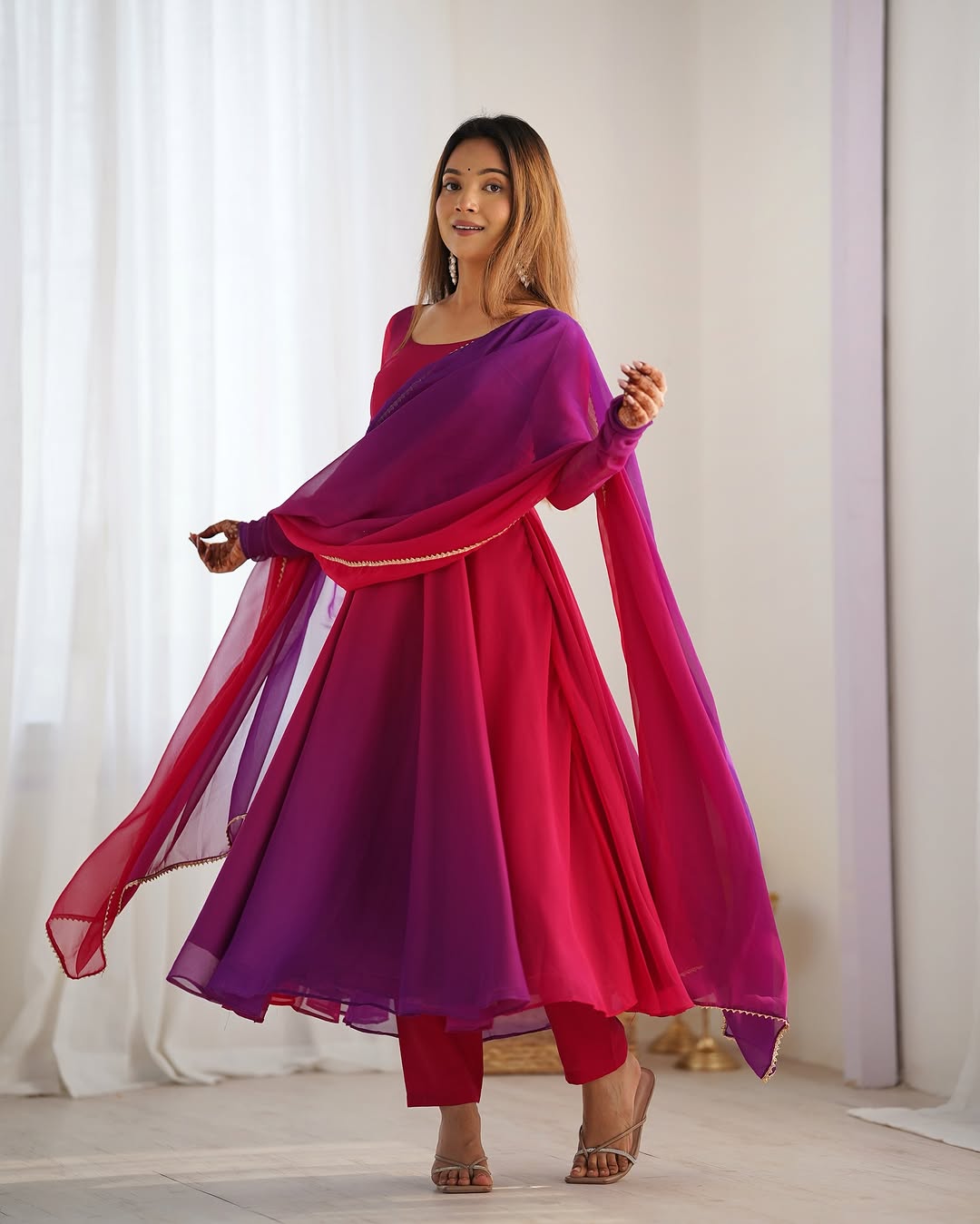 Dark pink georgette flared Devika designer Anarkali gown