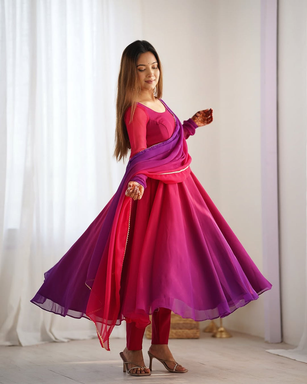 Dark pink georgette flared Devika designer Anarkali gown