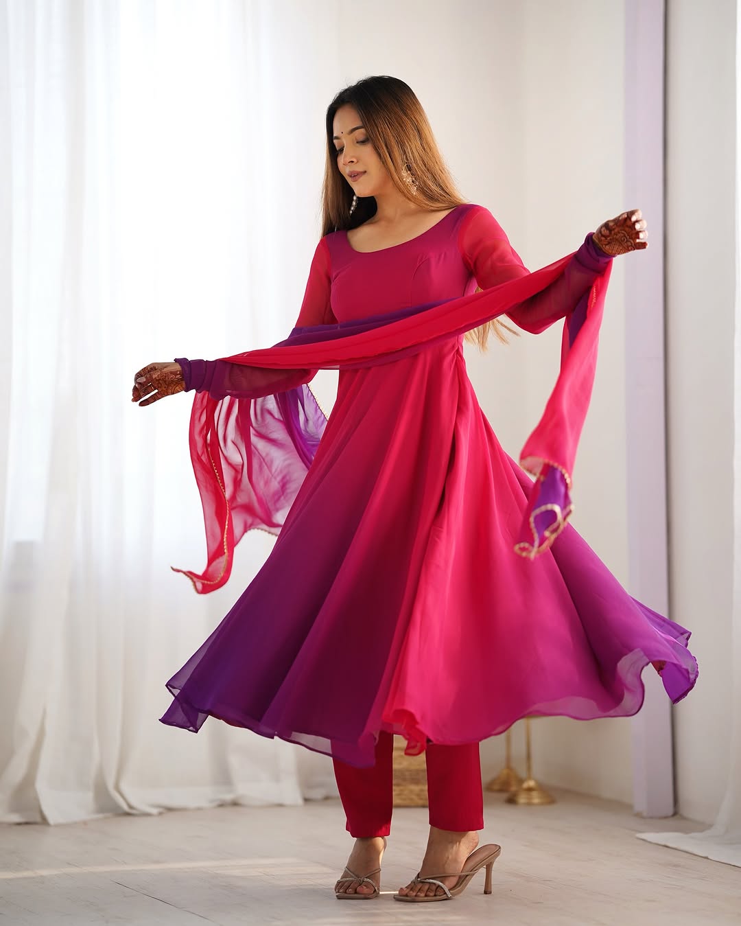 Dark pink georgette flared Devika designer Anarkali gown