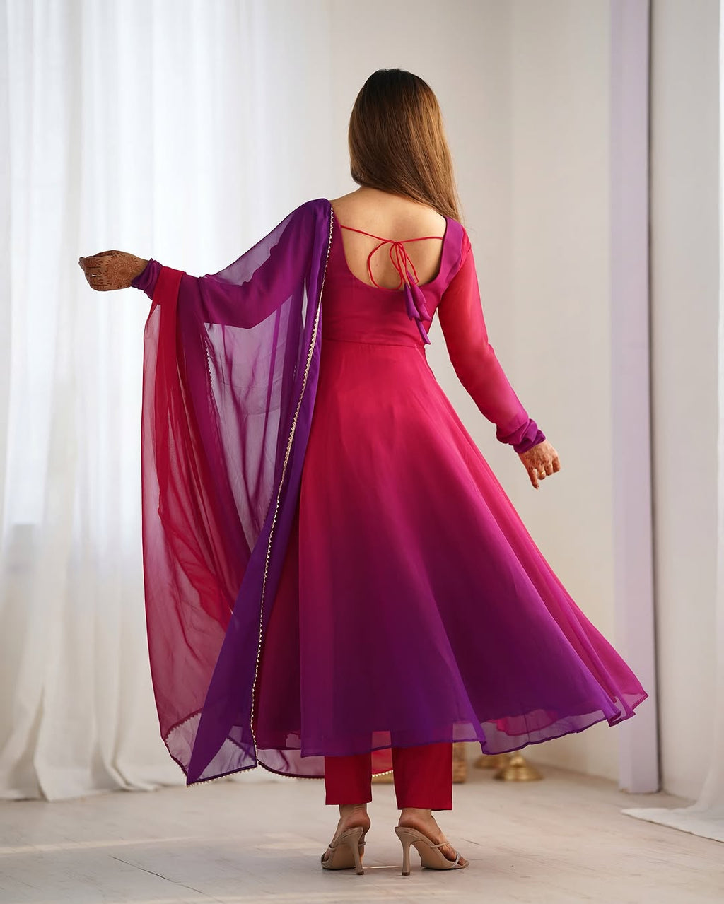 Dark pink georgette flared Devika designer Anarkali gown