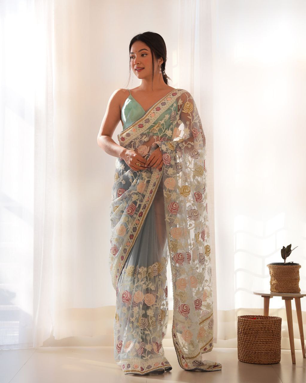 Fluttering elegance Aari embroidered butterfly net saree